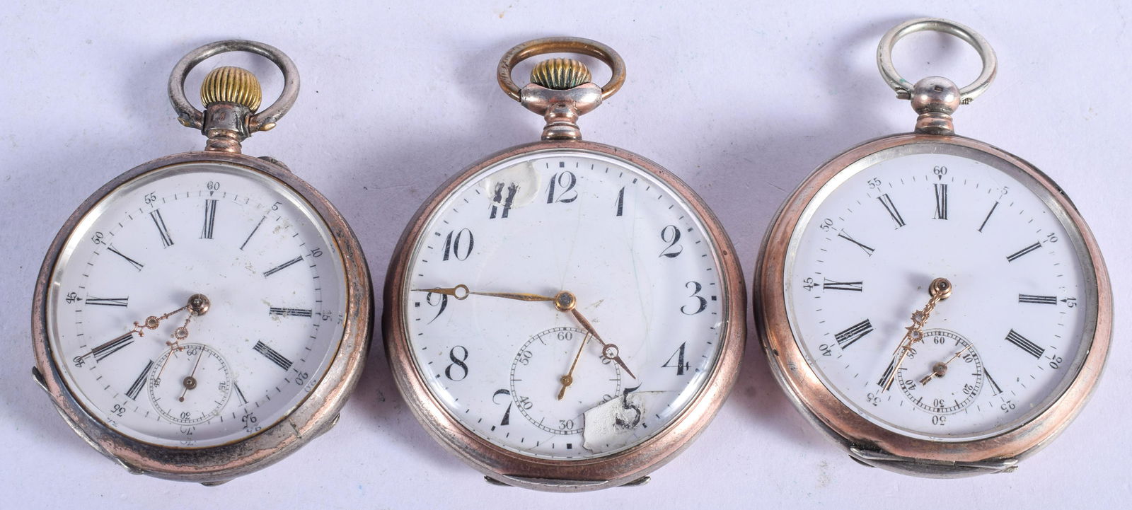 THREE ANTIQUE SILVER POCKET WATCHES. 5 cm wide. (3) (1 of 3)