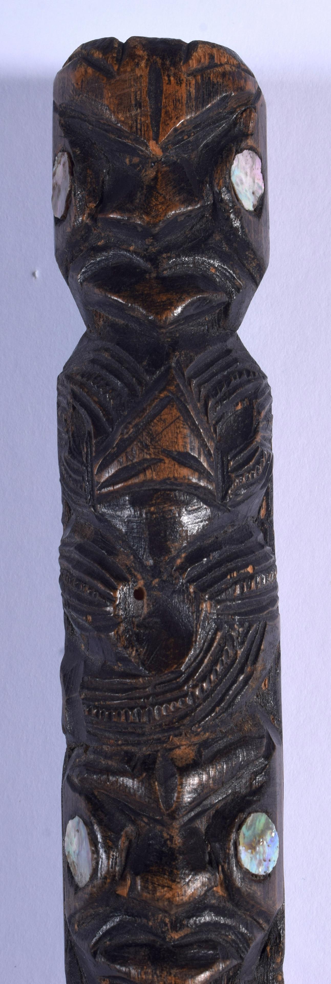 A POLYNESIAN MAORI SOUTHSEA ISLANDS MOTHER OF PEARL: A POLYNESIAN MAORI SOUTHSEA ISLANDS MOTHER OF PEARL PADDLE SPEAR decorated with figures. 62 cm long.