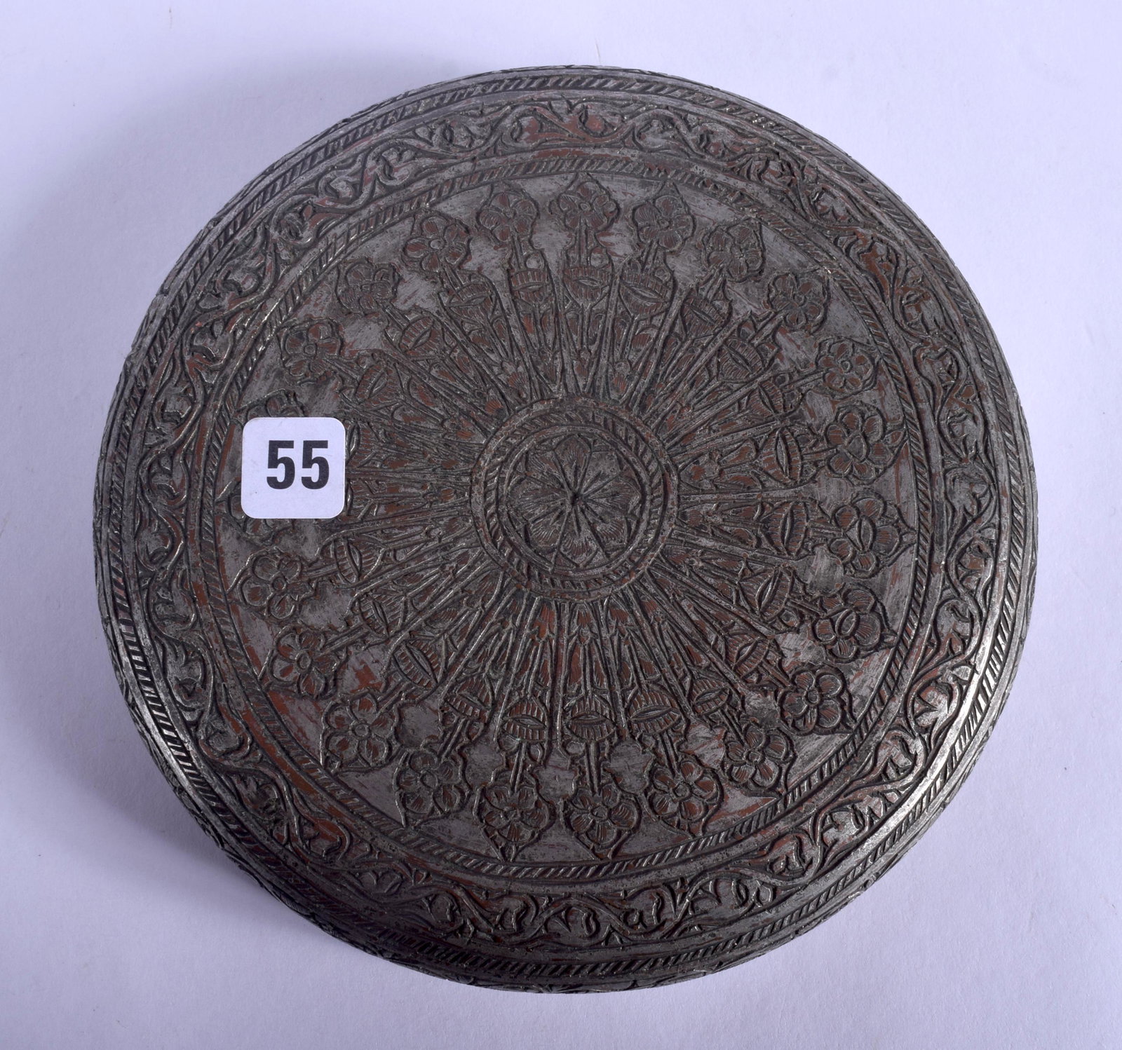 A 17TH CENTURY SAFAVID TINNED COPPER COVER Persia,: A 17TH CENTURY SAFAVID TINNED COPPER COVER Persia, decorated with foliage and motifs. 12 cm wide.