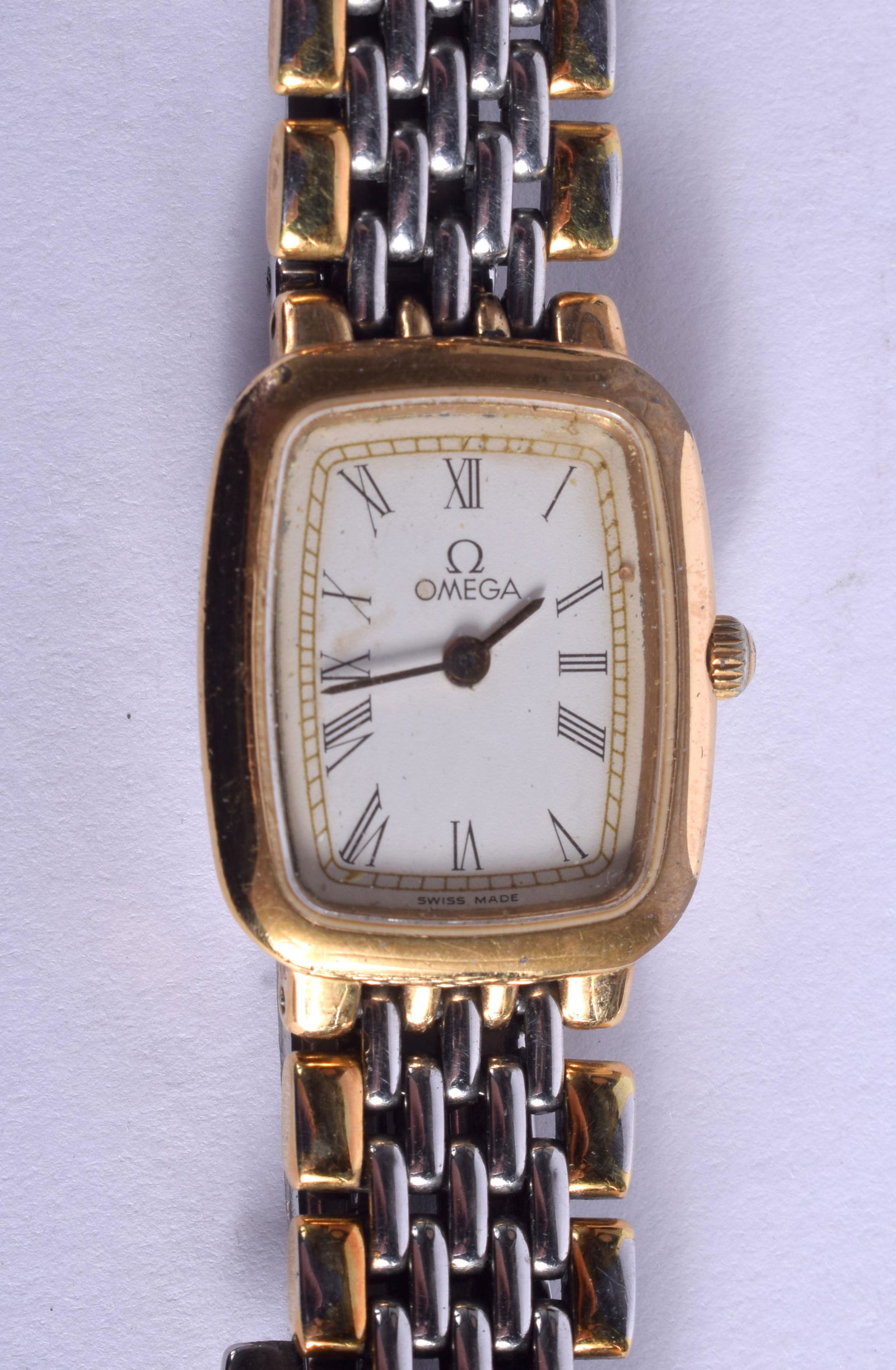 AN OMEGA GOLD PLATED WRISTWATCH. 2 cm wide. (1 of 3)