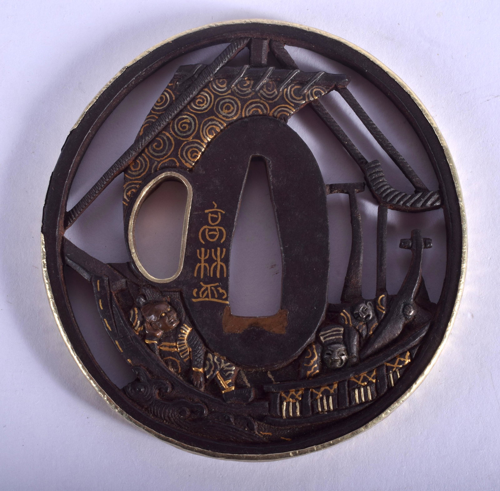 A BOXED 19TH CENTURY JAPANESE EDO PERIOD GOLD INLAID: A BOXED 19TH CENTURY JAPANESE EDO PERIOD GOLD INLAID IRON TSUBA decorated with figures upon a boat. 7 cm x 7 cm.