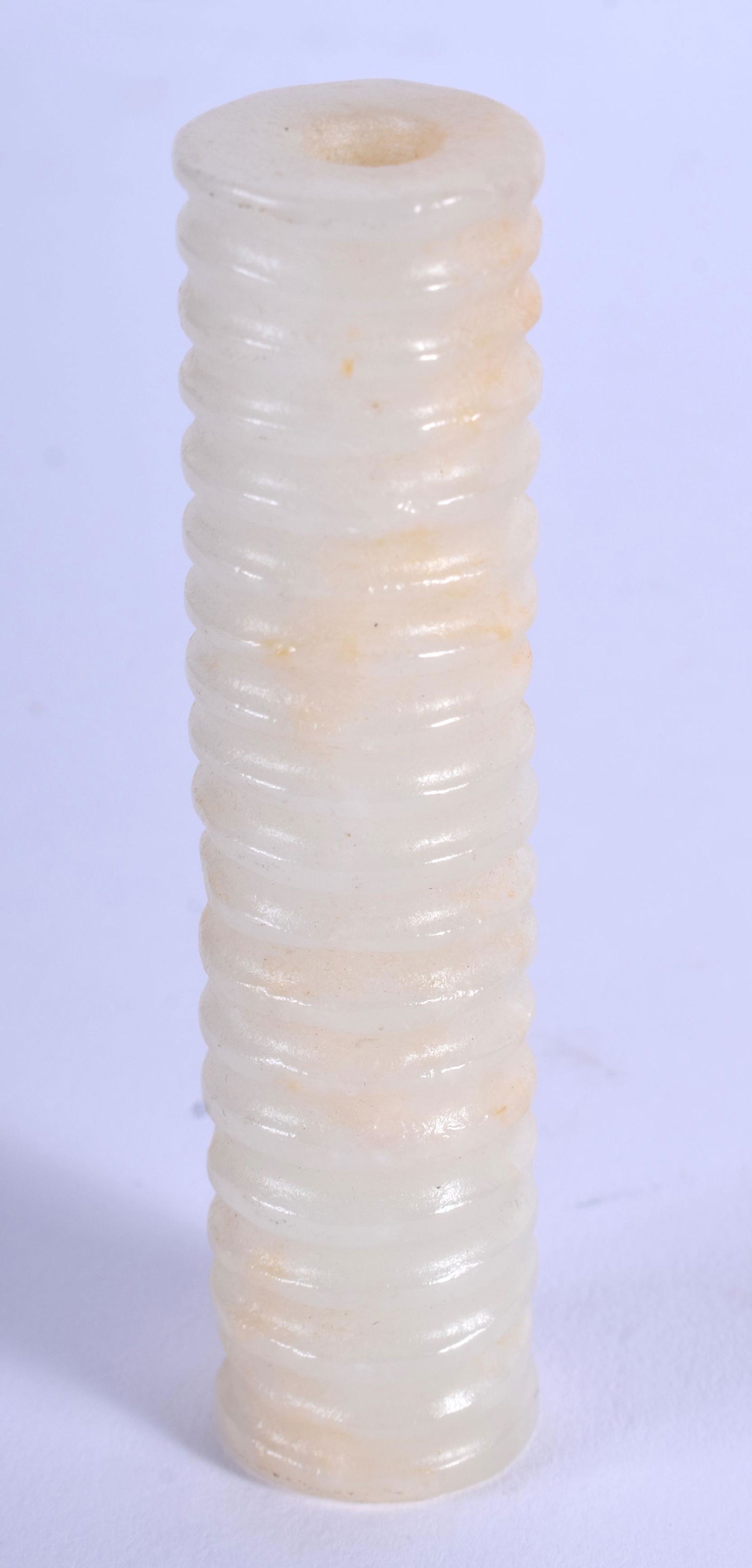 AN EARLY 20TH CENTURY CHINESE CARVED WHITE JADE TOGGLE (1 of 2)