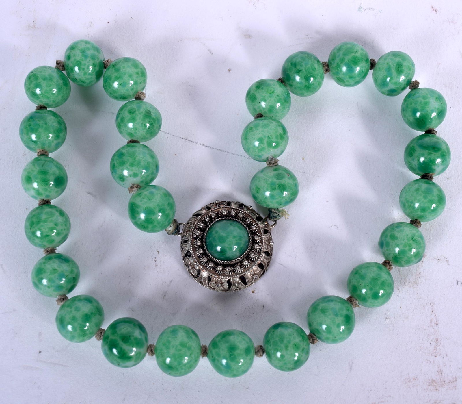 AN EARLY 20TH CENTURY EASTERN JADEITE NECKLACE, formed (1 of 1)
