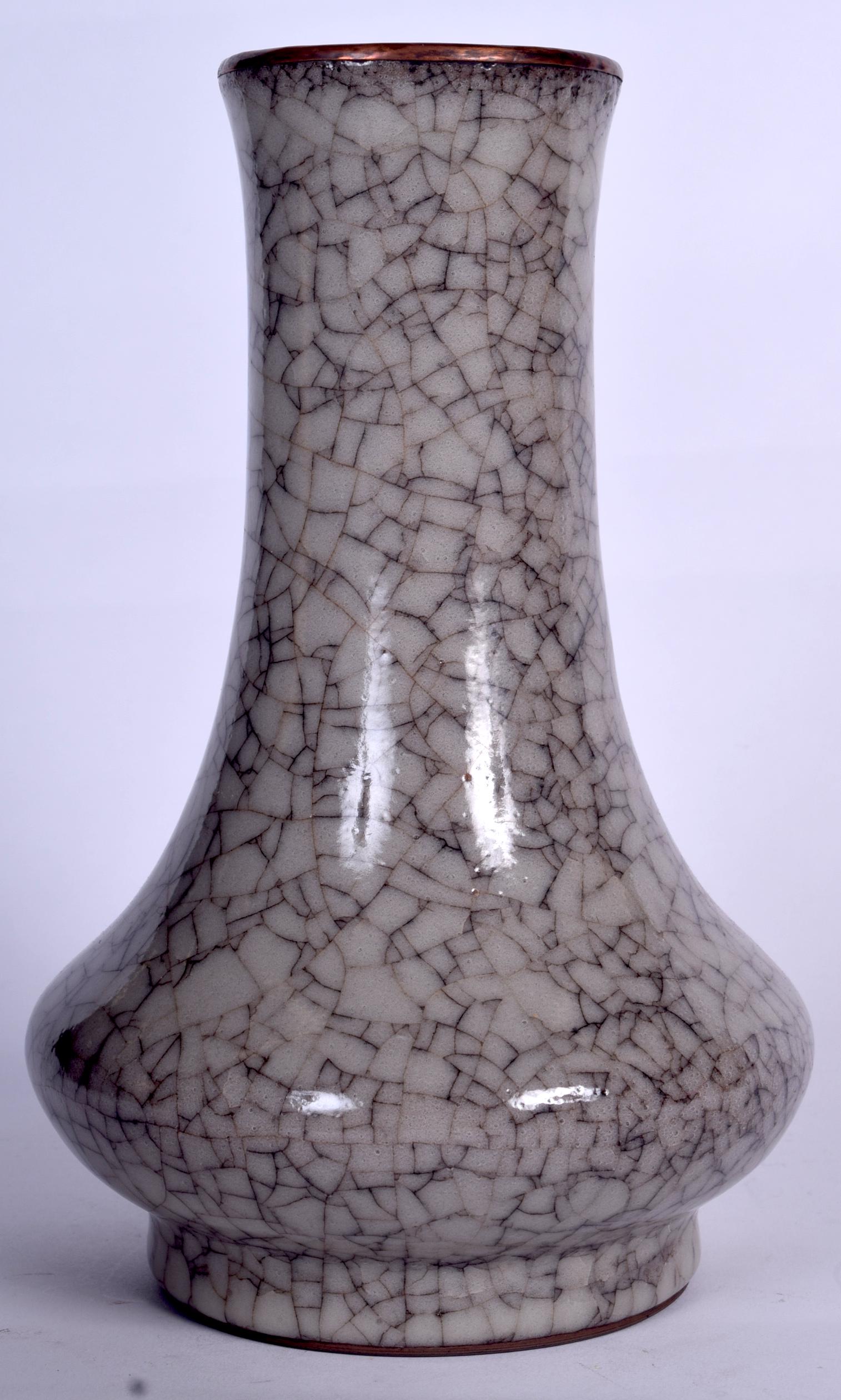A CHINESE GE TYPE POTTERY VASE, formed with a copper (1 of 2)