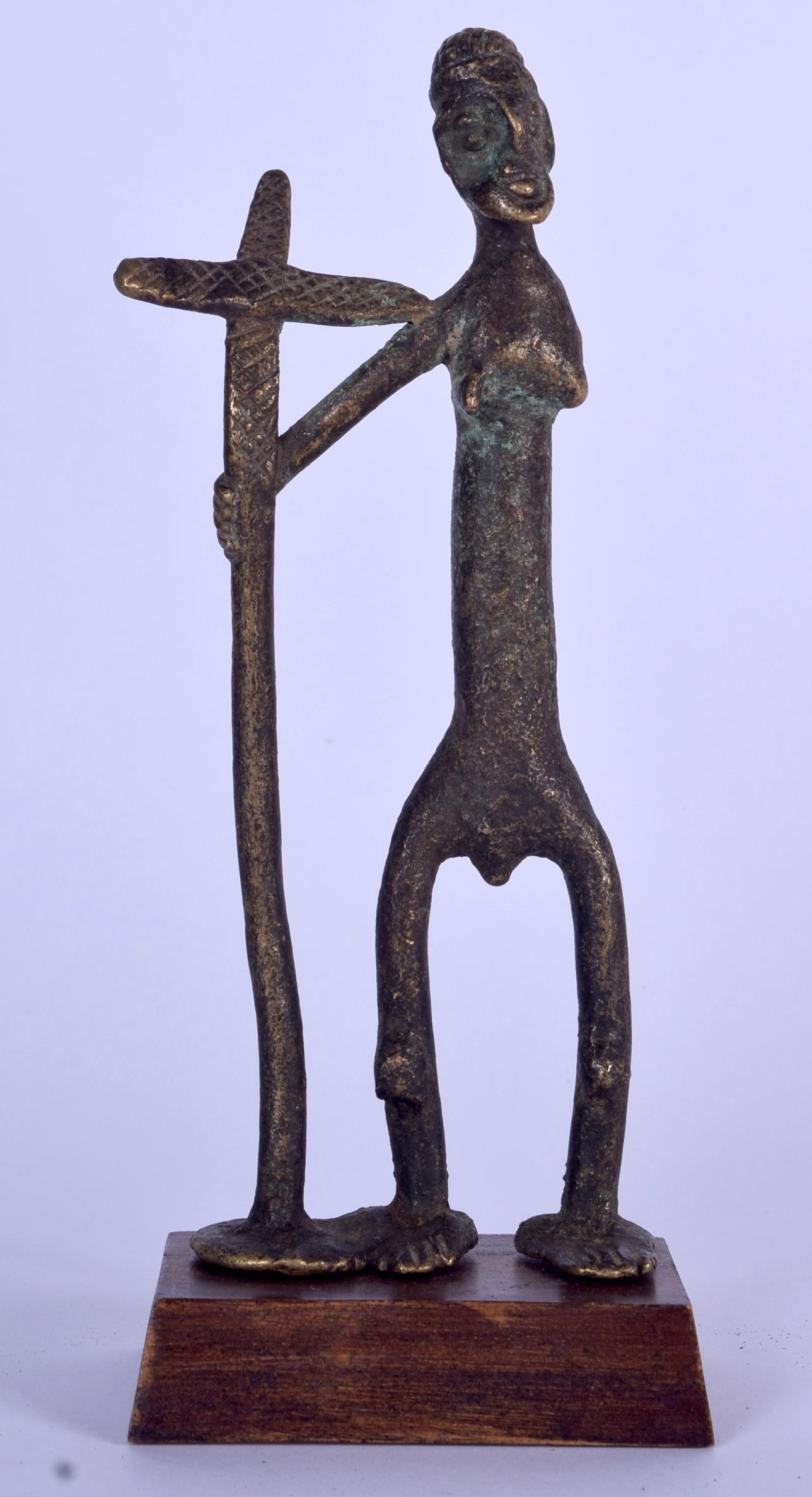 A BENIN BRONZE FIGURE OF AN ELONGATED MALE, modelled (1 of 1)