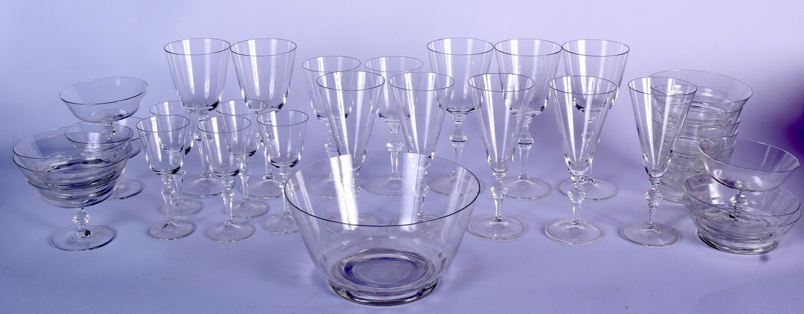 A QUANTITY OF MOSER MOZART GLASS WARE, varying size.: A QUANTITY OF MOSER MOZART GLASS WARE, varying size. (qty)1 Large Bowl5 Shallow bowls5 bowls5 Sherry Glasses5 Champagne Glasses2 Wine Glasses5 Red Wine Glasses
