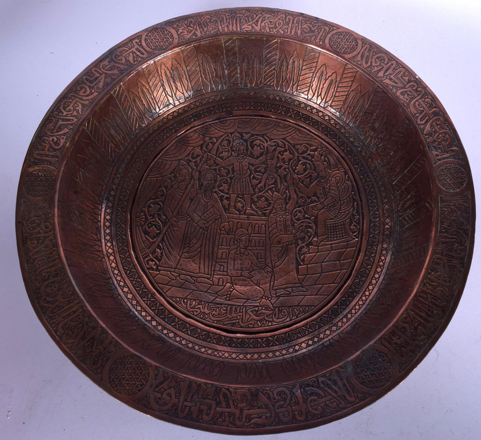 A LARGE 19TH CENTURY ISLAMIC COPPER BOWL, decorated: A LARGE 19TH CENTURY ISLAMIC COPPER BOWL, decorated with figures and calligraphy.