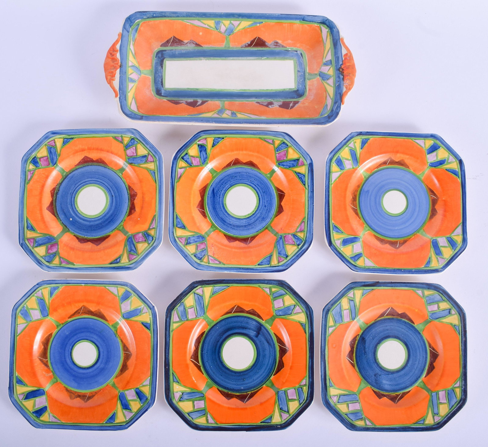 A RARE ART DECO BARKER BROTHERS JOHN GUILDFORD: A RARE ART DECO BARKER BROTHERS JOHN GUILDFORD ARABESQUE SANDWHICH DISH with six matching saucers. Largest 27 cm wide. (7)