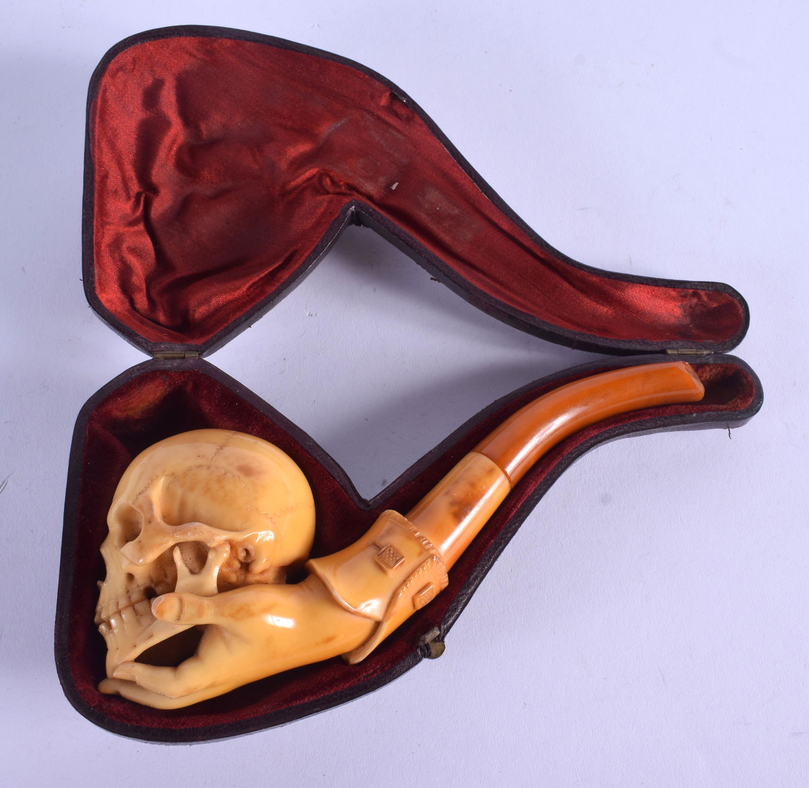 A RARE 19TH CENTURY CARVED AMBER SKULL PIPE possibly a (1 of 4)