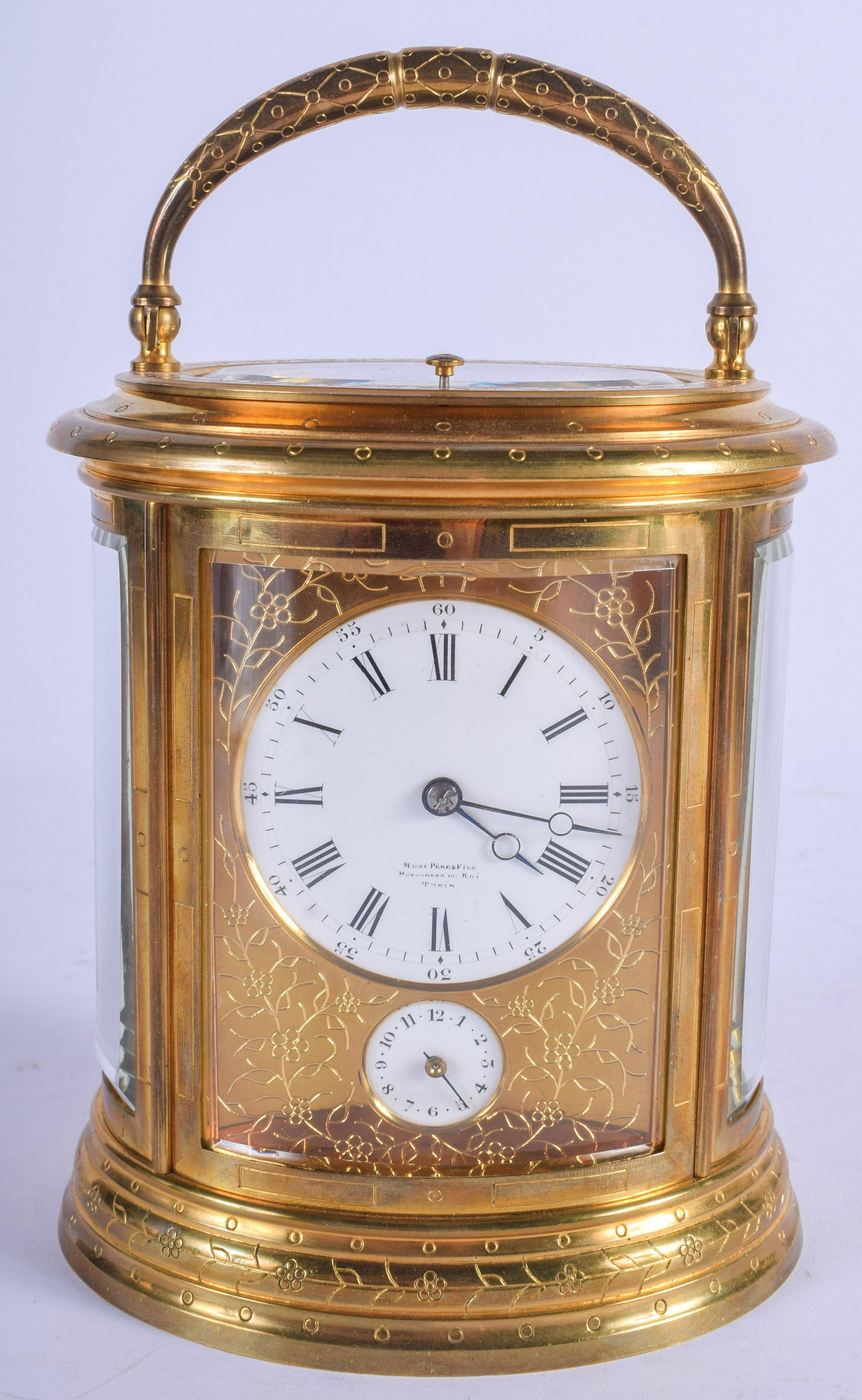 A 19TH CENTURY FRENCH REPEATING GRAND SONNERIE CARRIAGE: A 19TH CENTURY FRENCH REPEATING GRAND SONNERIE CARRIAGE CLOCK with dual foliate inscribed dial. 19 cm high inc handle.