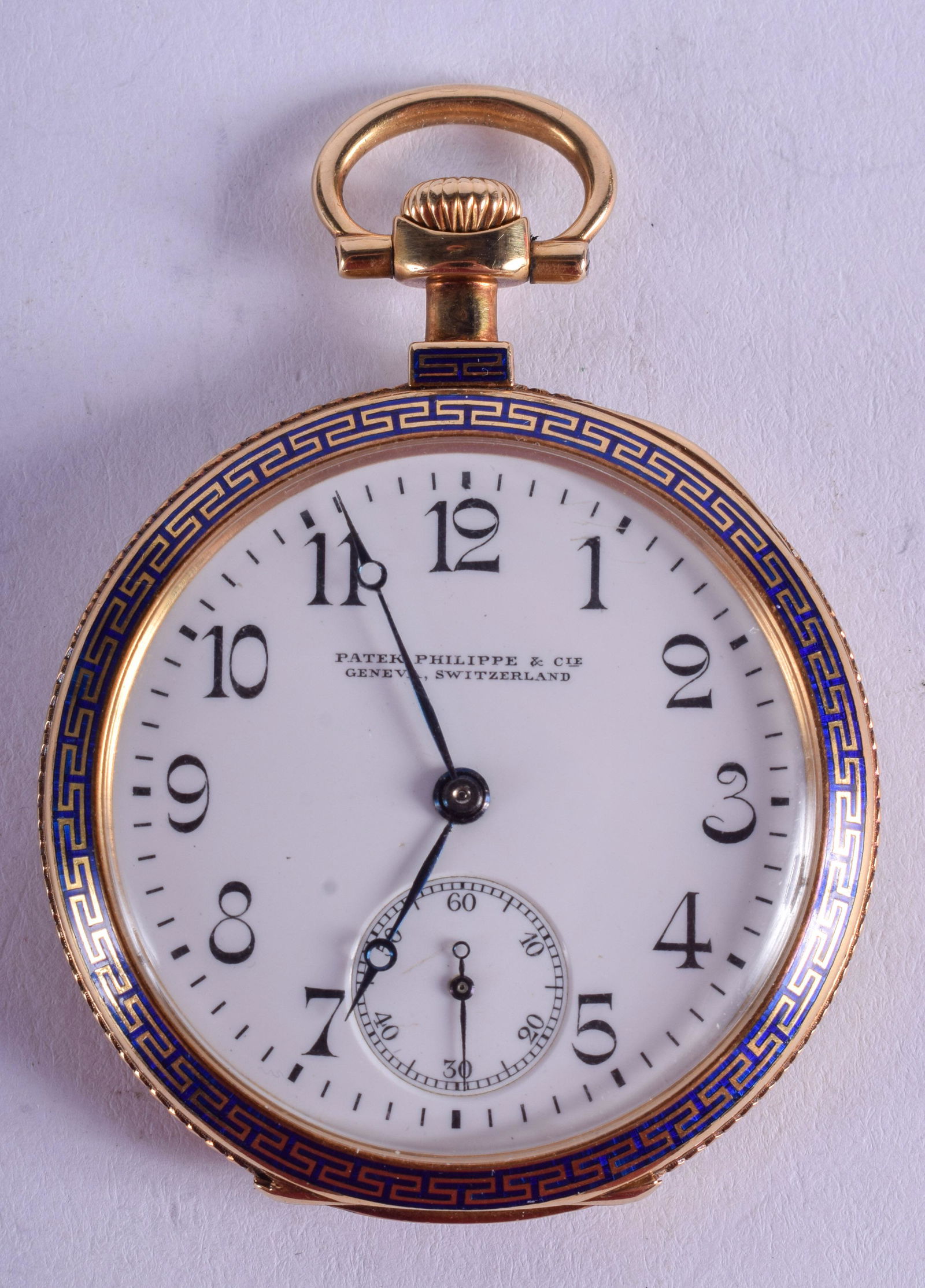 A FINE 18CT GOLD SWISS PATEK PHILIPPE ENAMEL POCKET: A FINE 18CT GOLD SWISS PATEK PHILIPPE ENAMEL POCKET WATCH with Greek key banding. 62.4 grams overall. 4 cm wide.