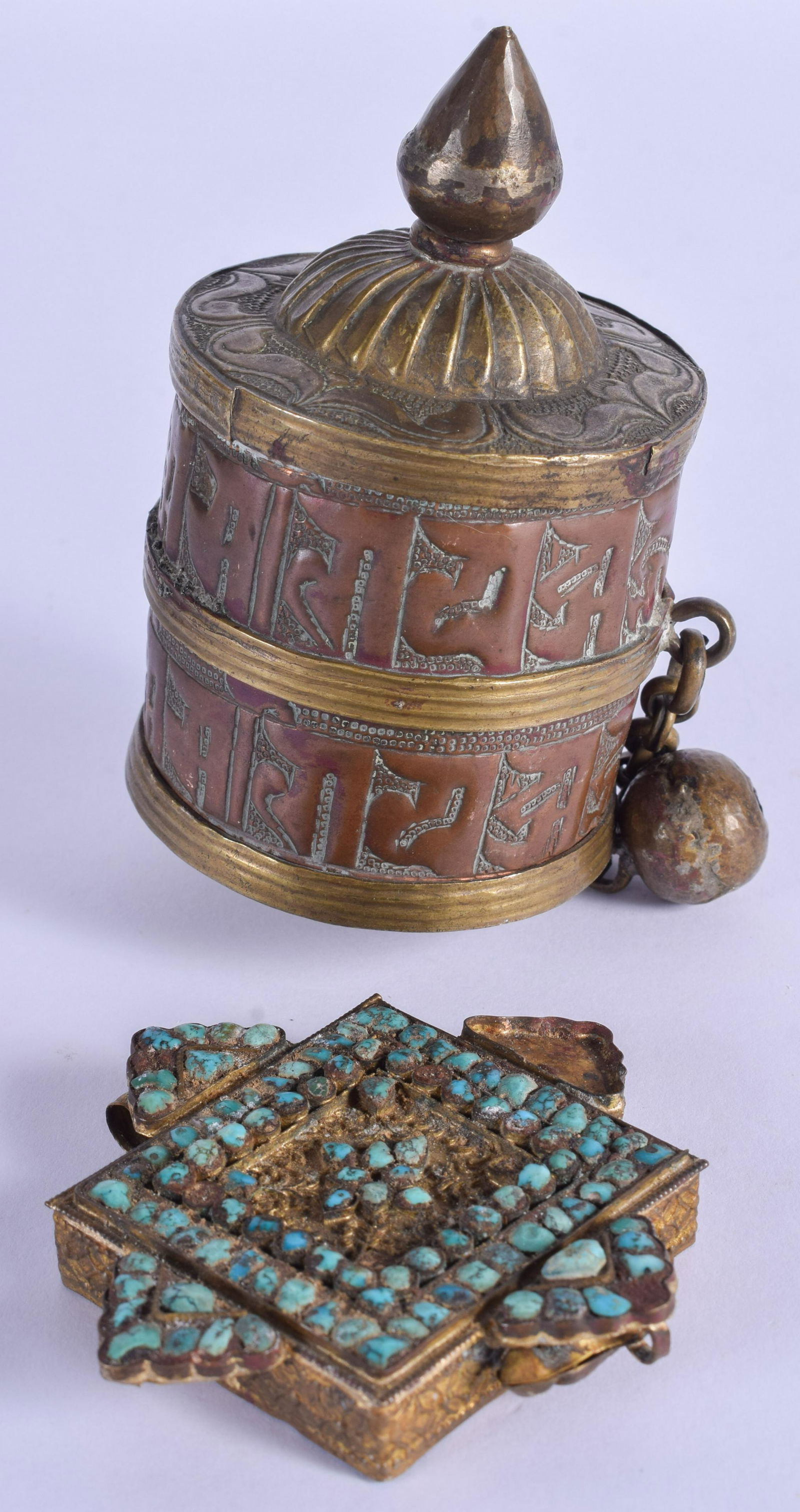 AN EARLY 20TH CENTURY TIBETAN COPPER PRAYER WHEEL and a (1 of 2)