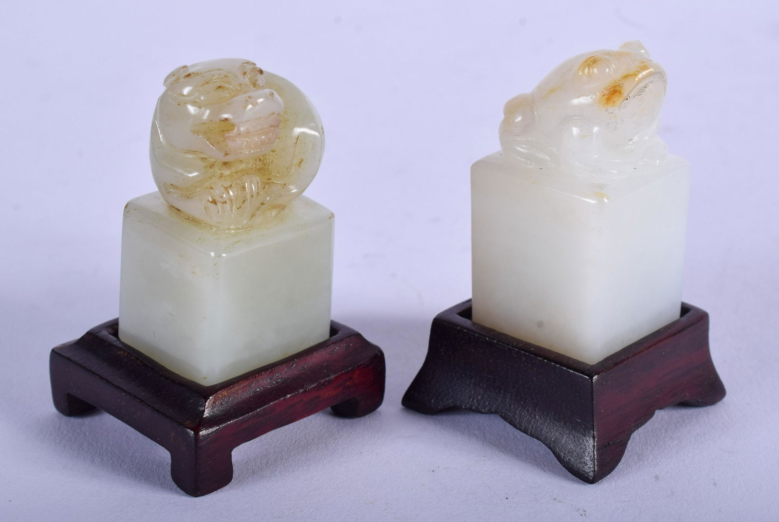 A PAIR OF EARLY 20TH CENTURY CHINESE CARVED JADE SEALS (1 of 3)