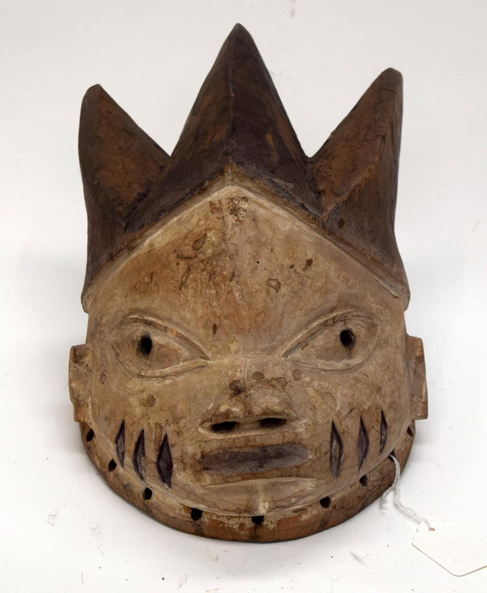 A TRIBAL YORUBA MASK. Nigeria. 17cm x 19cm x 28: A TRIBAL YORUBA MASK. Nigeria. 17cm x 19cm x 28cm