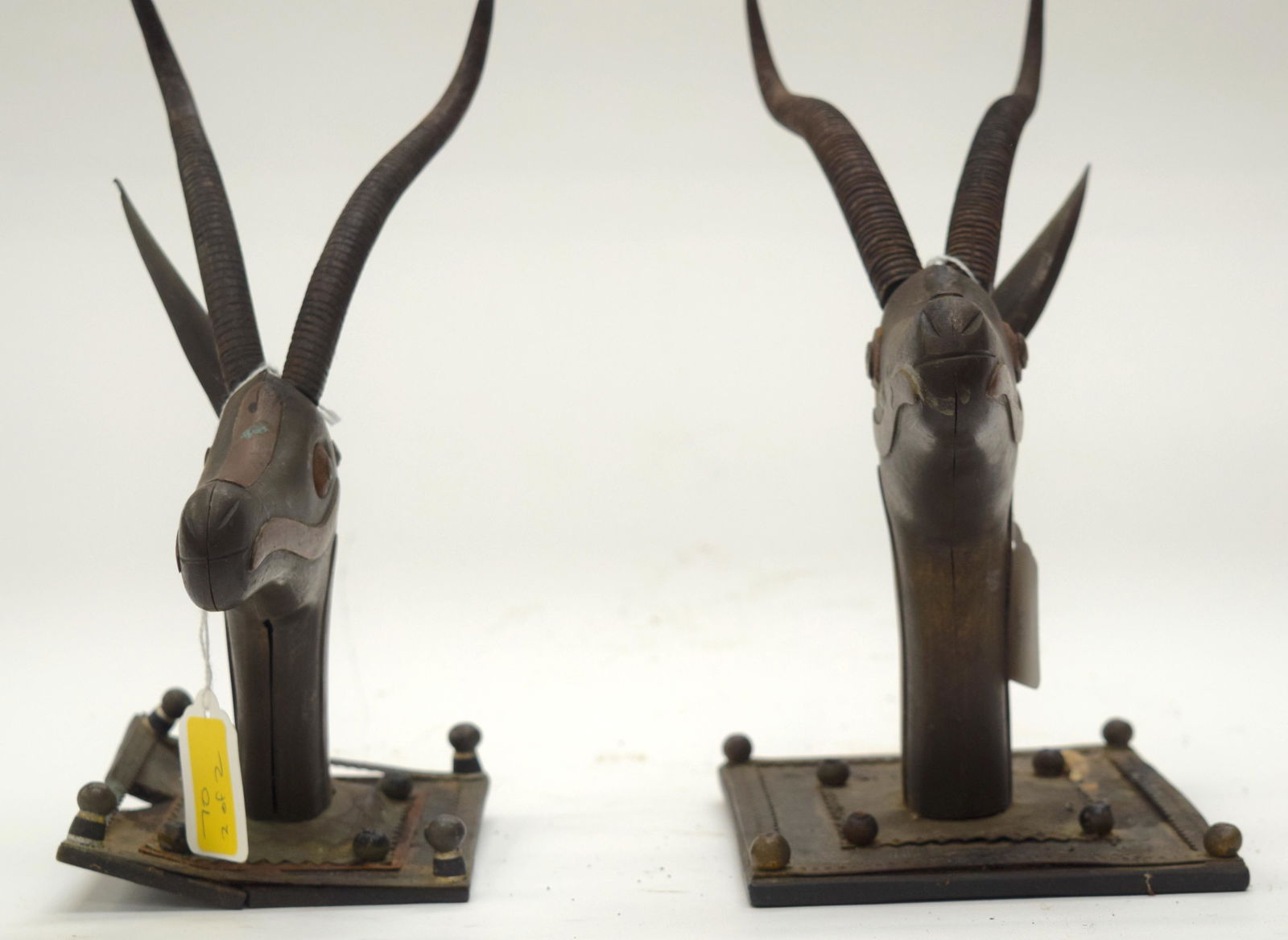 TWO TRIBAL CARVED ANTELOPE HEADS.  (2) (1 of 6)