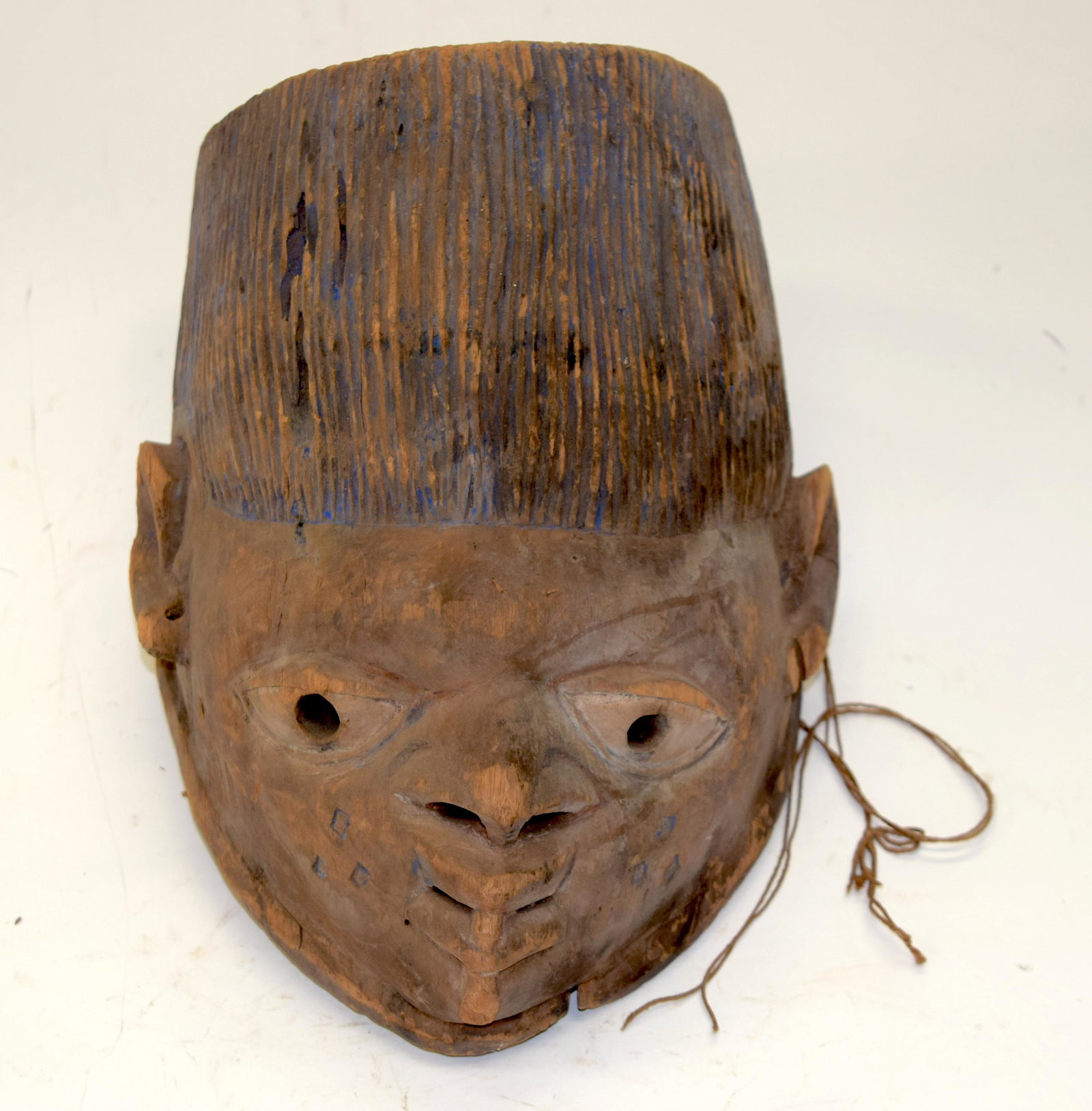 A TRIBAL YORUBA GELEDE HELMET MASK. Nigeria. 19: A TRIBAL YORUBA GELEDE HELMET MASK. Nigeria. 19cm x 13cm x 33cm
