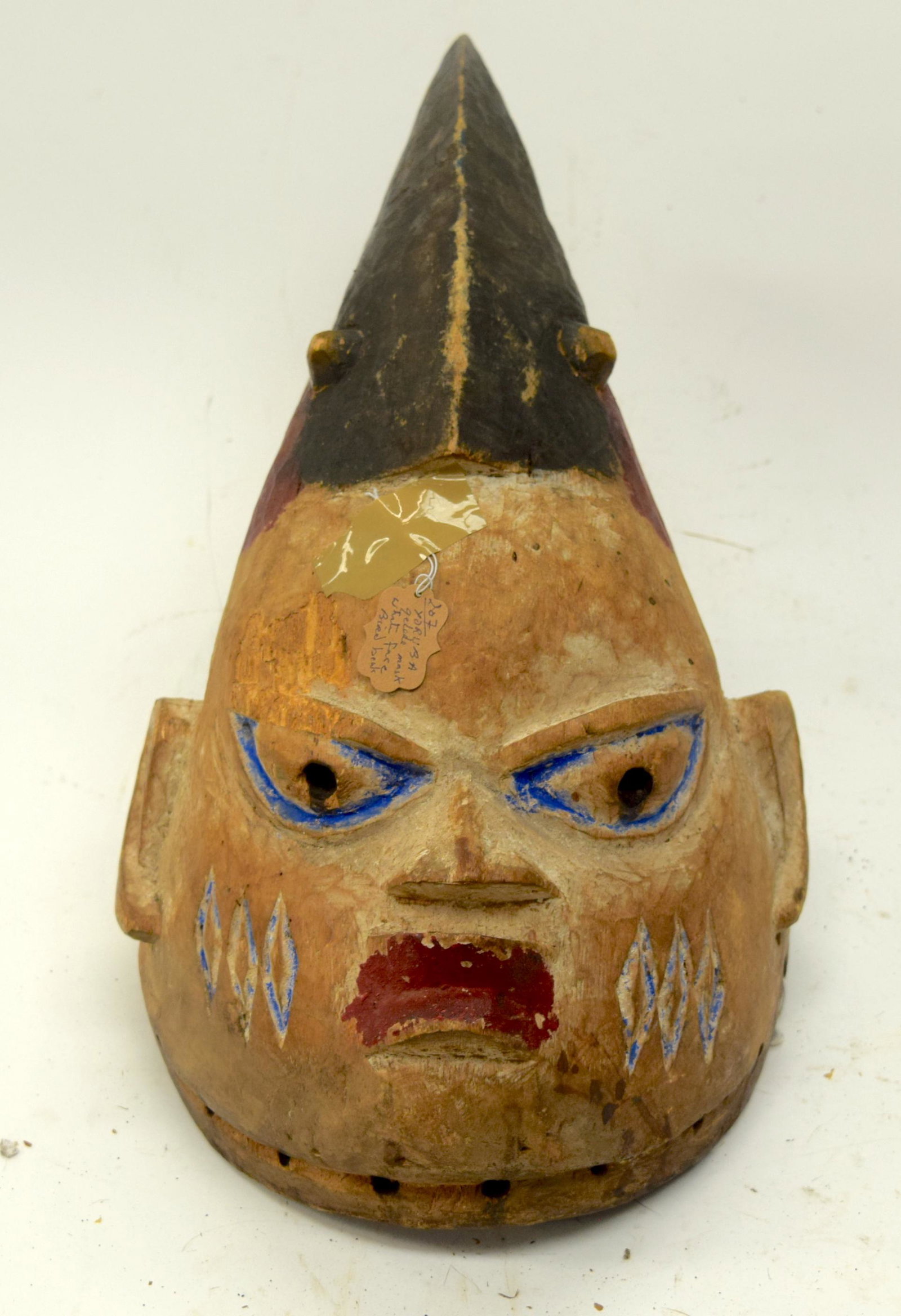 A TRIBAL YORUBA GELEDE HELMET MASK. Nigeria. 19: A TRIBAL YORUBA GELEDE HELMET MASK. Nigeria. 19cm x 20cm x 47cm