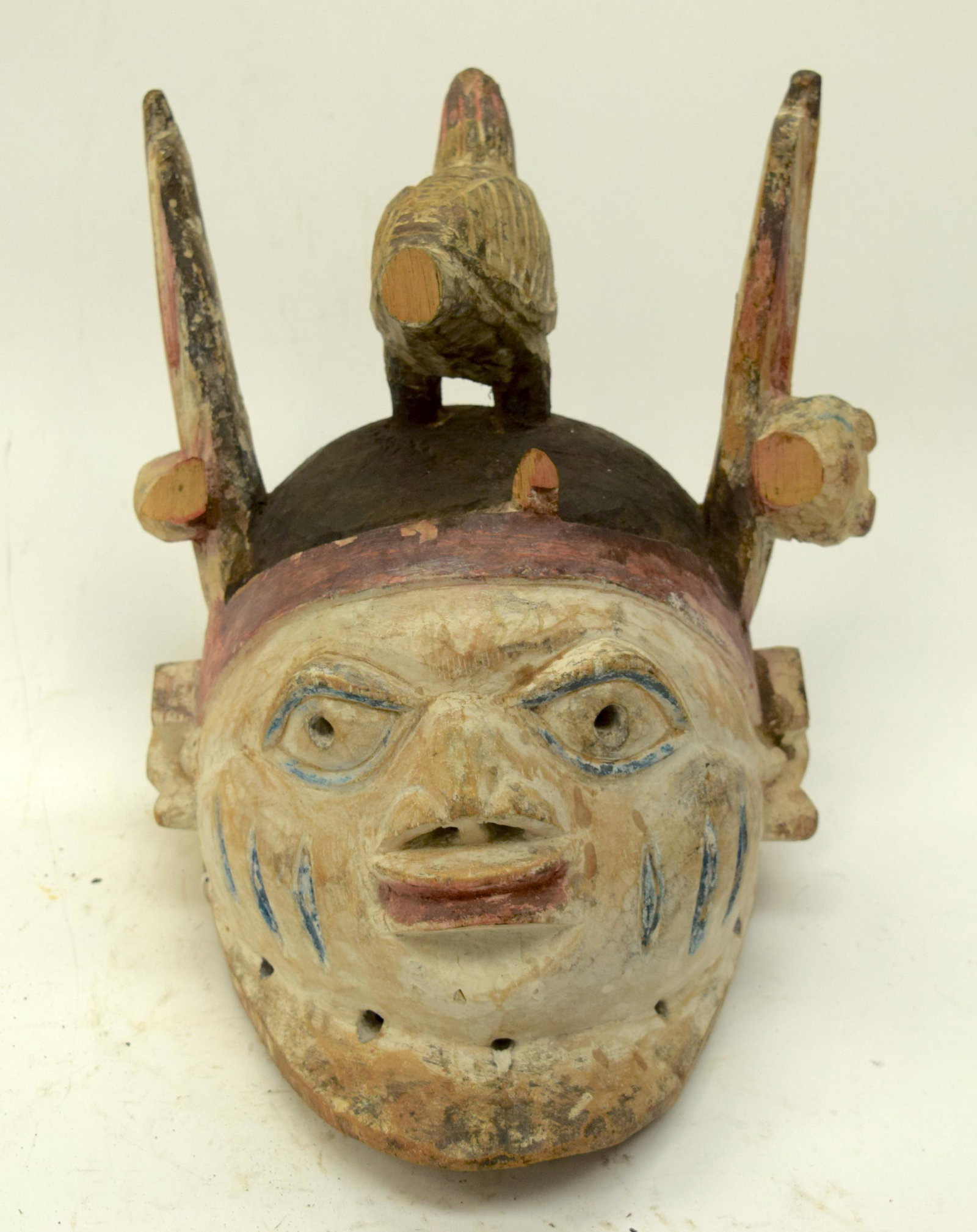 A TRIBAL YORUBA GELEDE HELMET MASK. Nigeria. 18: A TRIBAL YORUBA GELEDE HELMET MASK. Nigeria. 18cm x 25cm x 27cm