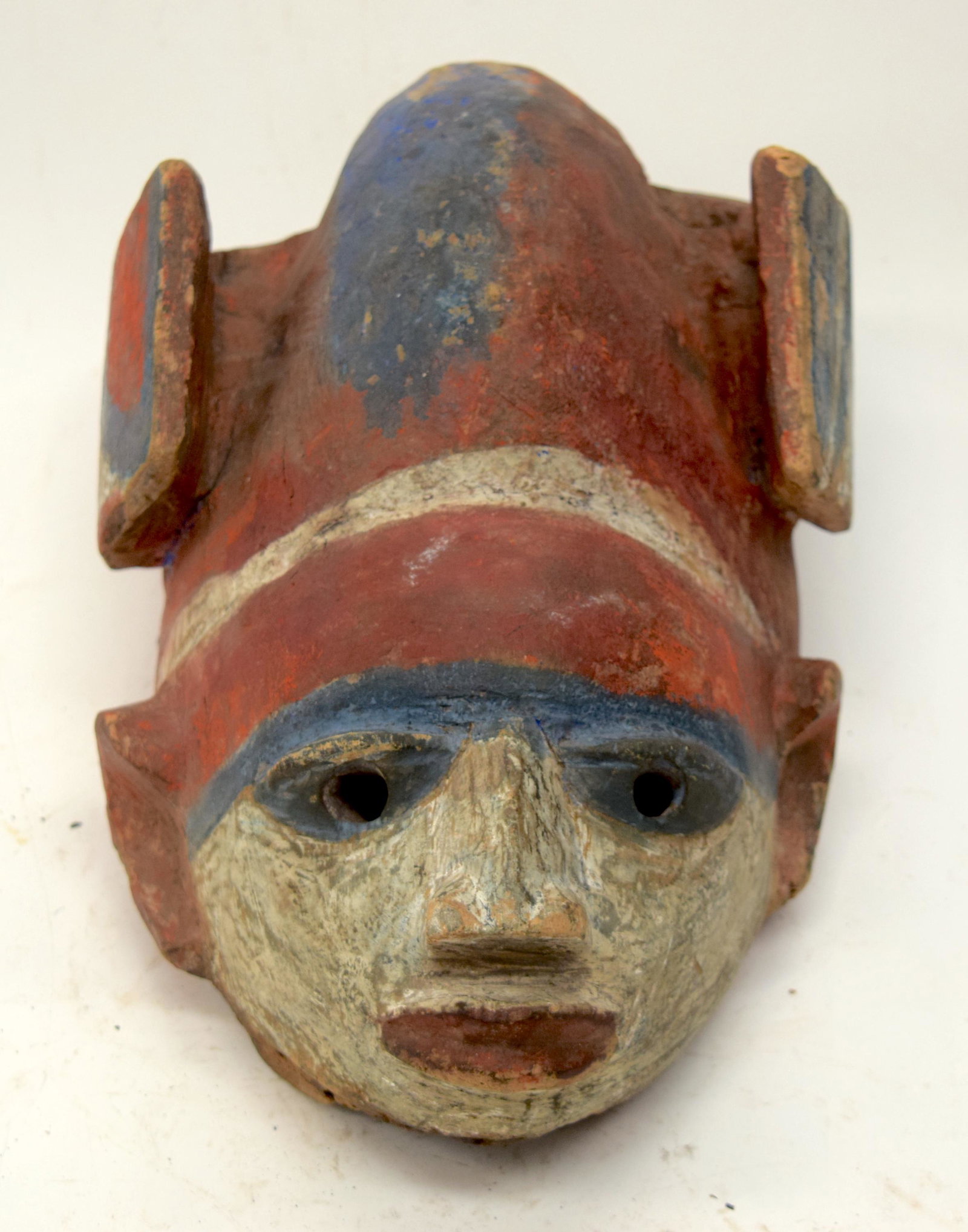 A TRIBAL YORUBA GELEDE HELMET MASK. Nigeria. 21: A TRIBAL YORUBA GELEDE HELMET MASK. Nigeria. 21cm x 16cm x 36cm