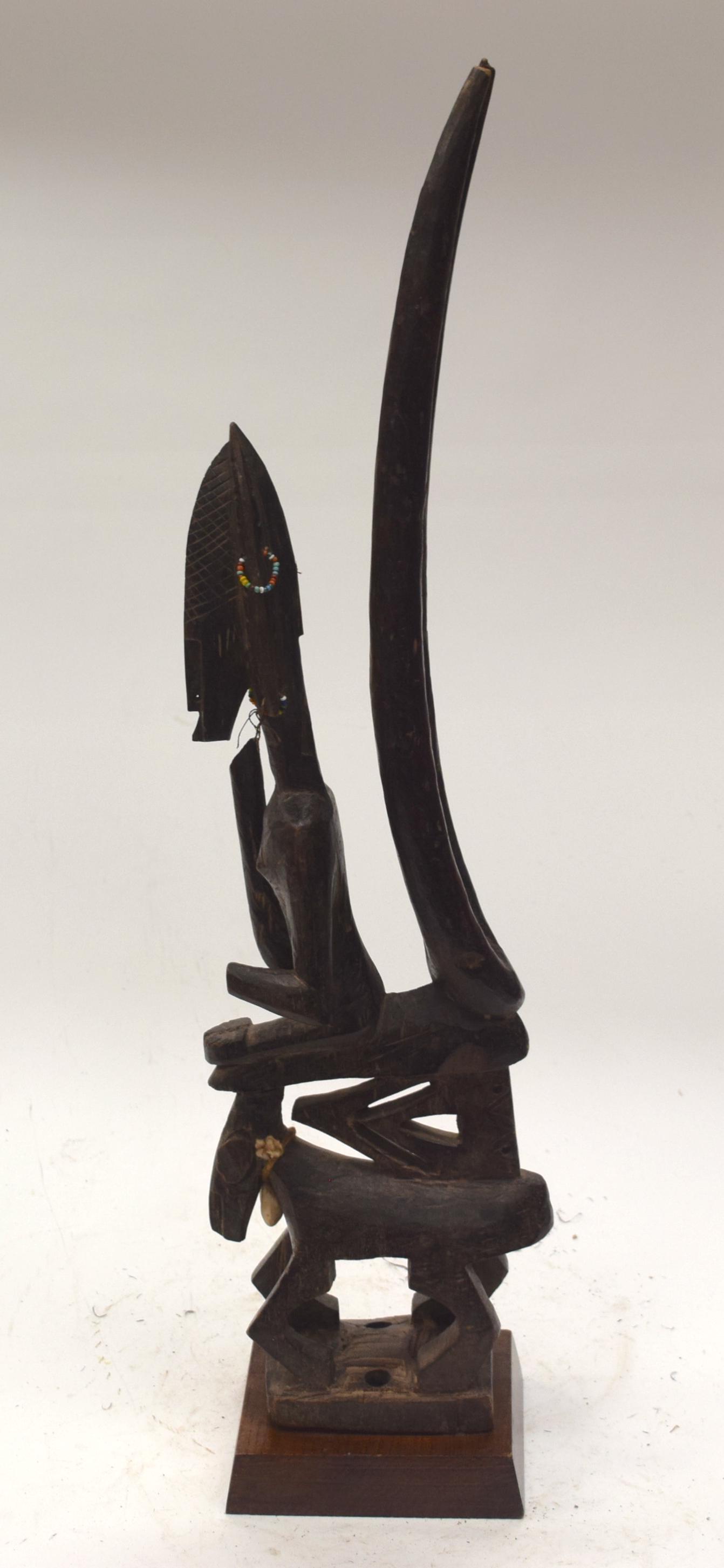 A TRIBAL BAMANA CI WARA HEADDRESS. Mali. 13cm x: A TRIBAL BAMANA CI WARA HEADDRESS. Mali. 13cm x 11cm x 63cm