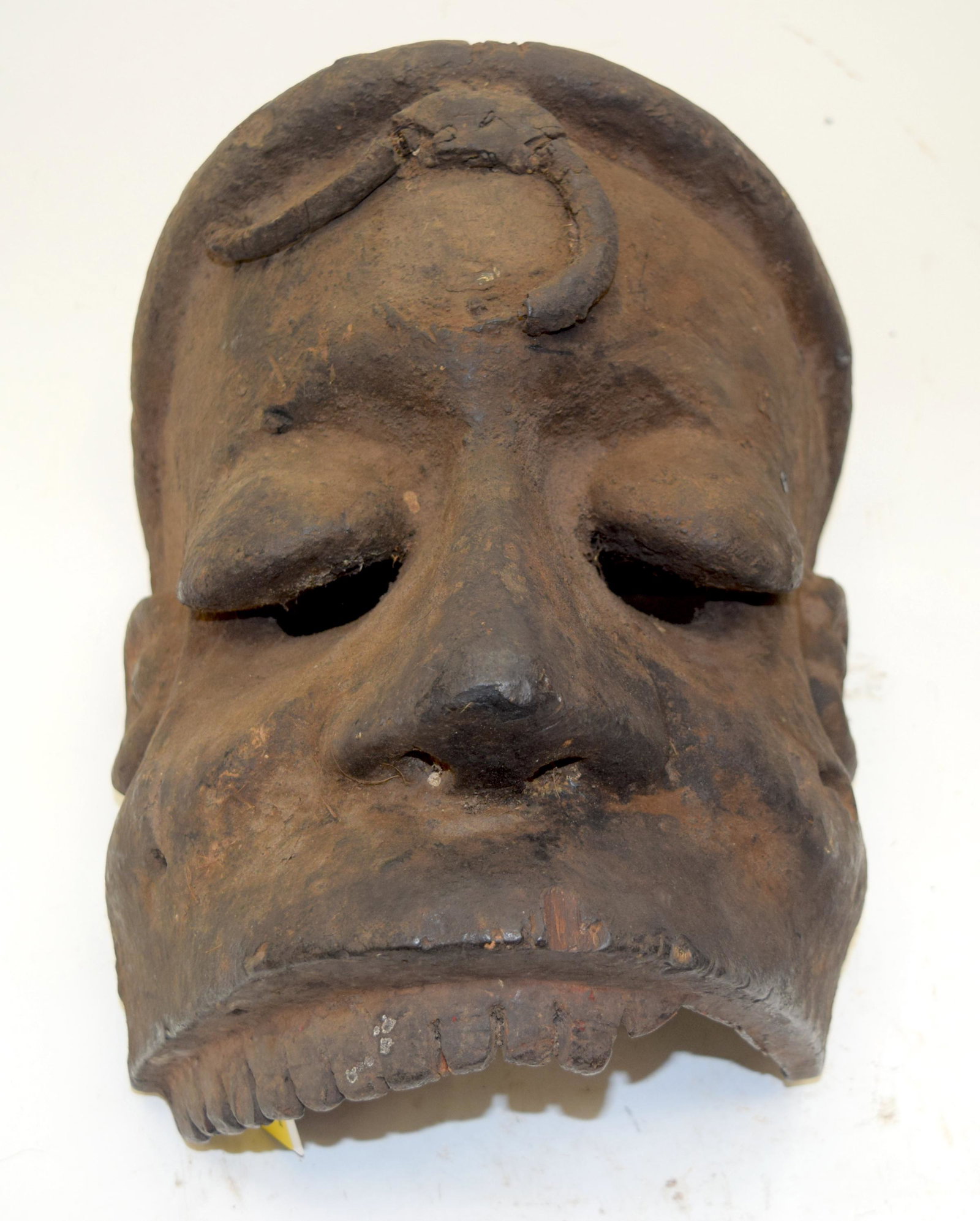 A TRIBAL OGONI MASK. Nigeria. 24cm x 29cm x 33c: A TRIBAL OGONI MASK. Nigeria. 24cm x 29cm x 33cm