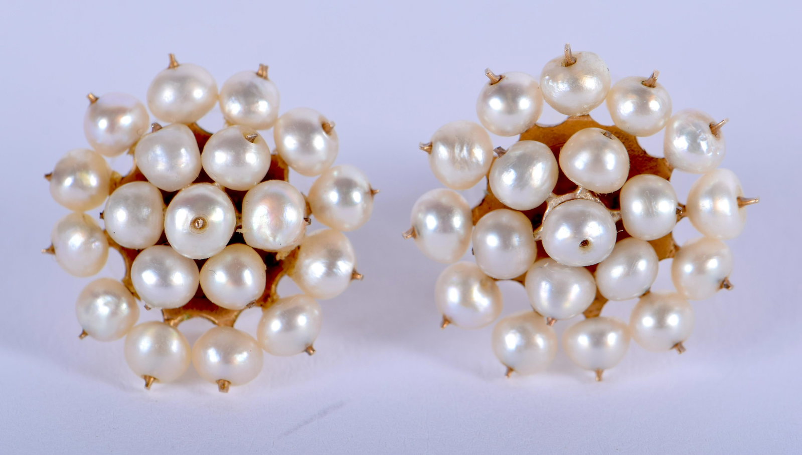 A PAIR OF EDWARDIAN GOLD AND PEARL EARRINGS. 1.5: A PAIR OF EDWARDIAN GOLD AND PEARL EARRINGS. 1.5 cm wide.