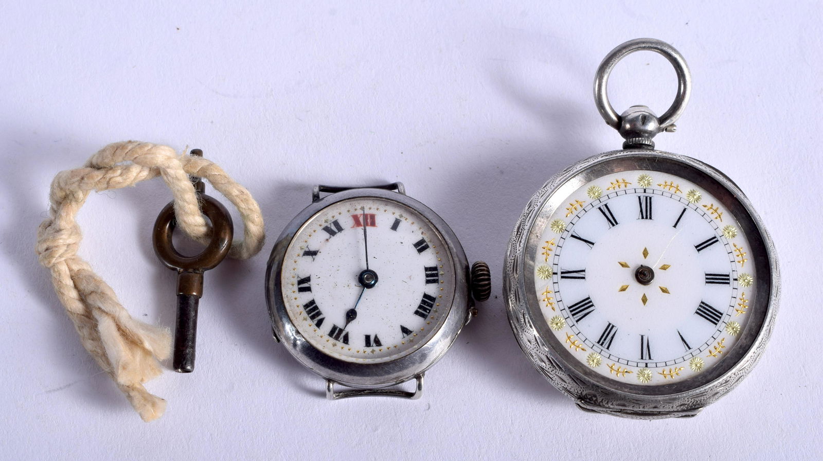 TWO ANTIQUE SILVER WATCHES. Largest 3.5 cm wide. (1 of 2)