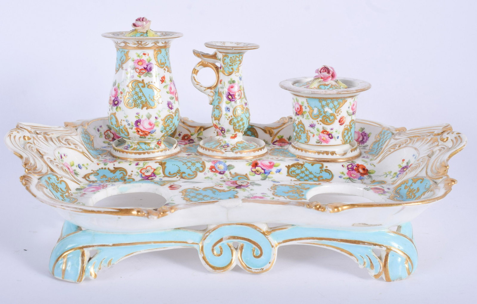 AN EARLY 19TH CENTURY ENGLISH PORCELAIN DESK STAN: AN EARLY 19TH CENTURY ENGLISH PORCELAIN DESK STAND C1830 possibly Coalport or Minton, painted with foliage. 30 cm x 16 cm.