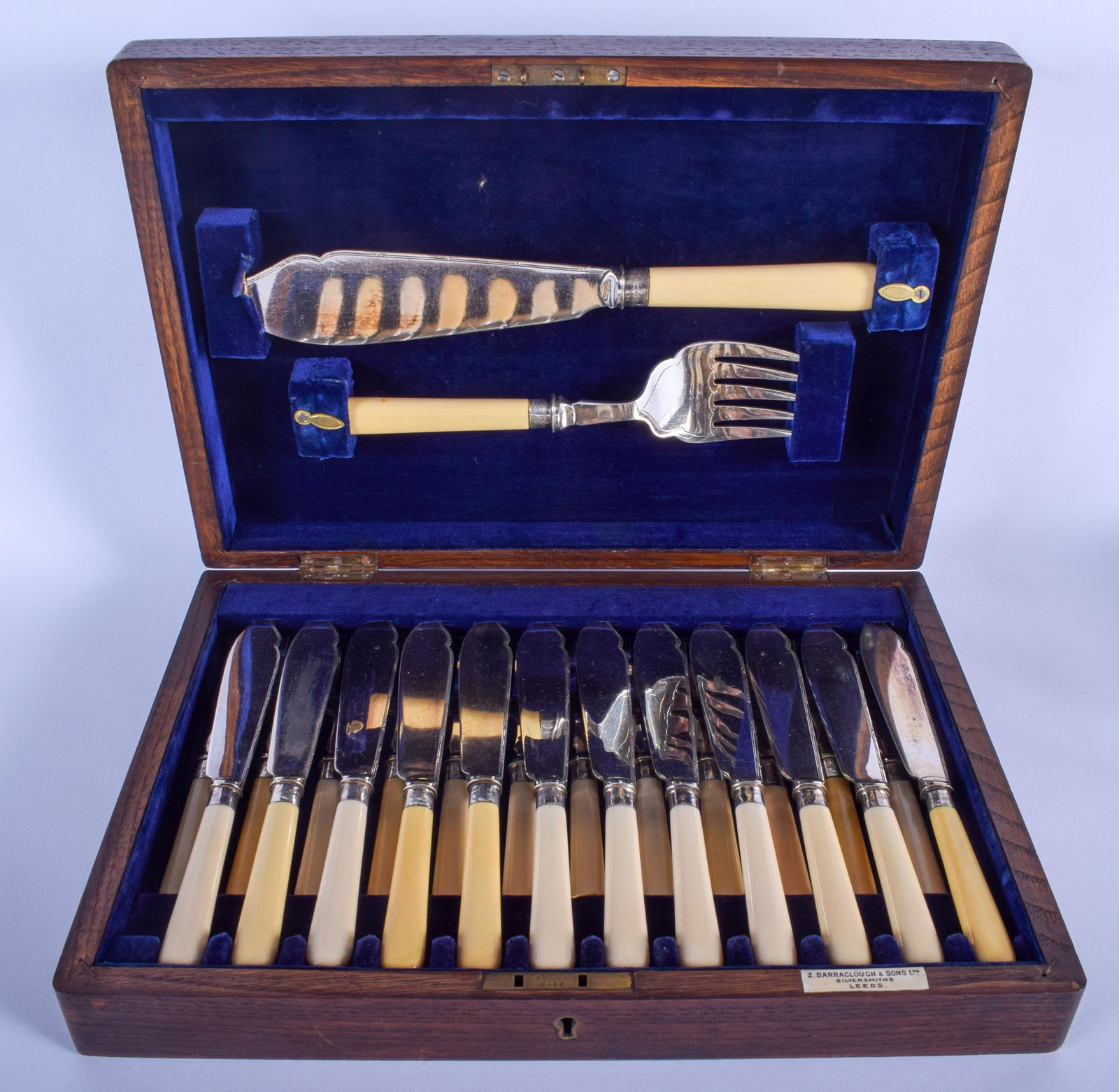 A CASED SET OF ANTIQUE SILVER COLLARED bone FISH: A CASED SET OF ANTIQUE SILVER COLLARED bone FISH KNIVES AND FORKS. (26)