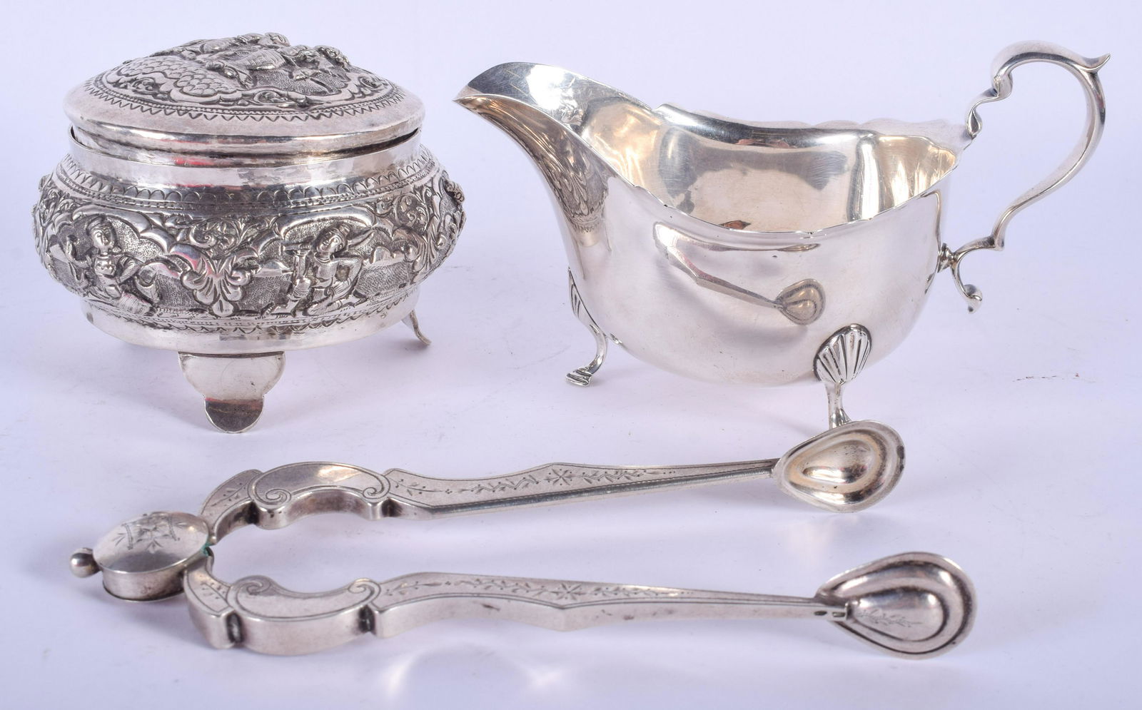 A SILVER SAUCEBOAT together with a silver box etc (1 of 5)