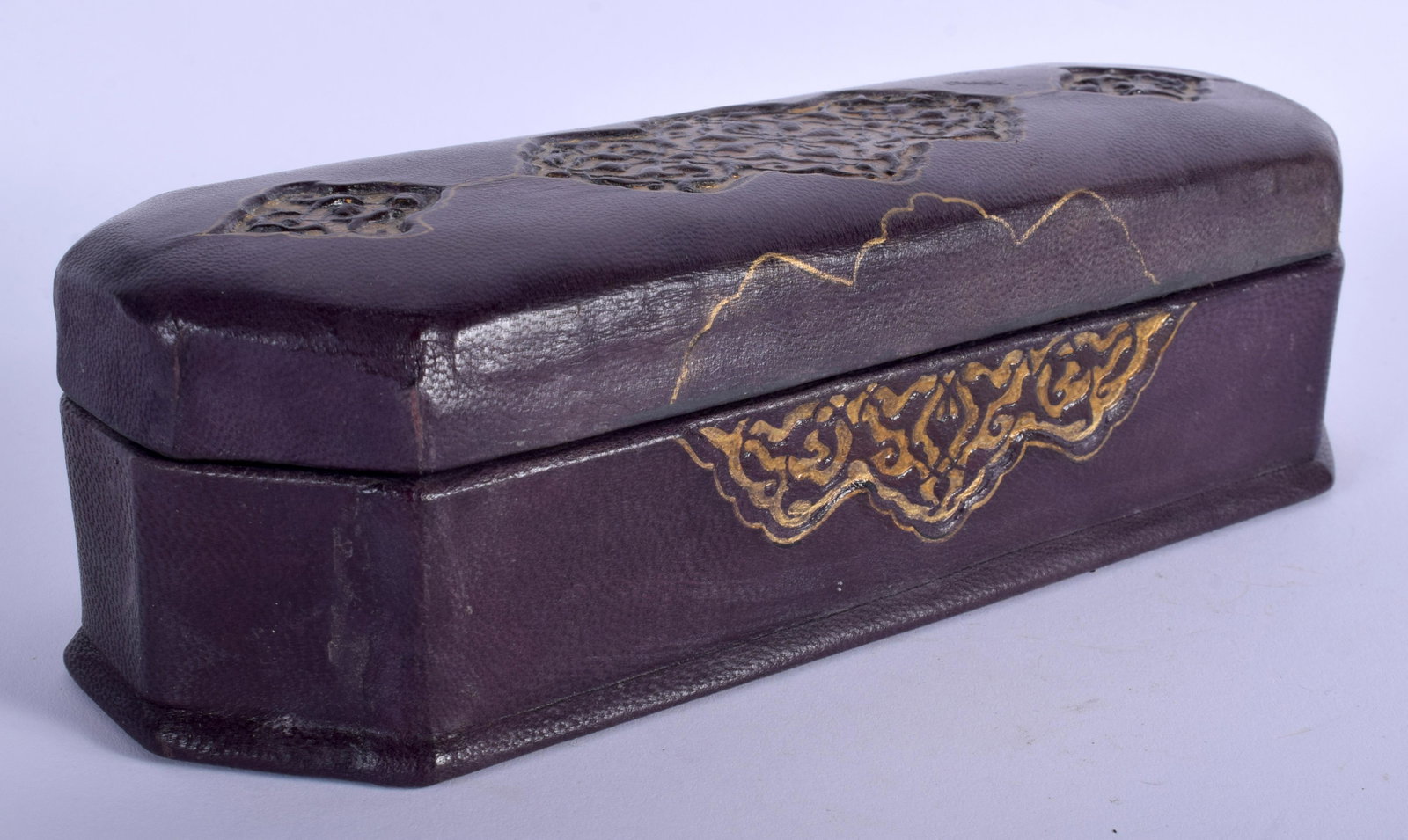 IS ISLAMIC TURKISH TOOLED LEATHER PEN BOX decorated: IS ISLAMIC TURKISH TOOLED LEATHER PEN BOX decorated with kufic script. 23 cm x 9 cm.