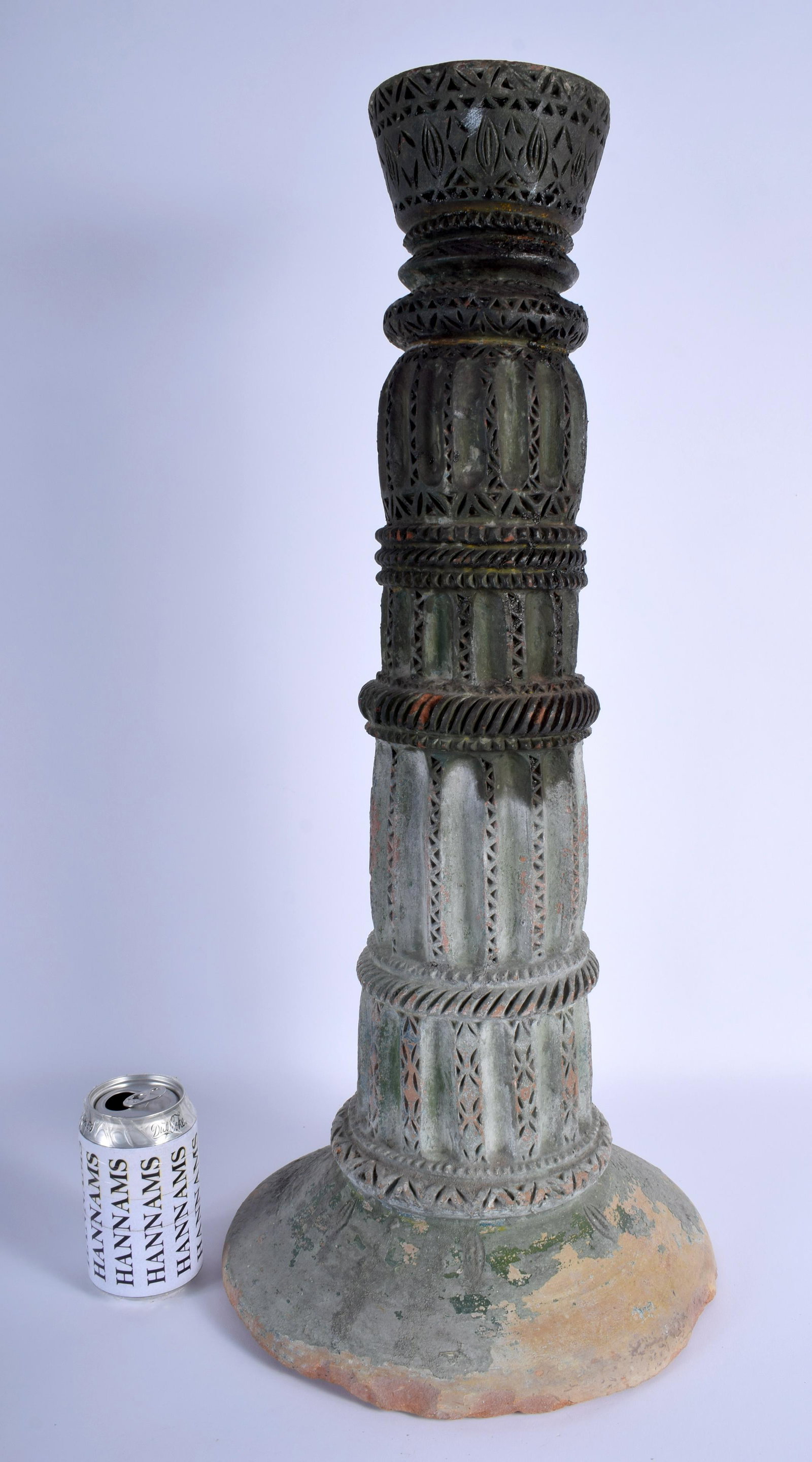 A LARGE 11TH CENTURY INDIAN ISLAMIC CANDLESTICK: A LARGE 11TH CENTURY INDIAN ISLAMIC CANDLESTICK decorated with motifs. 60 cm x 18 cm.