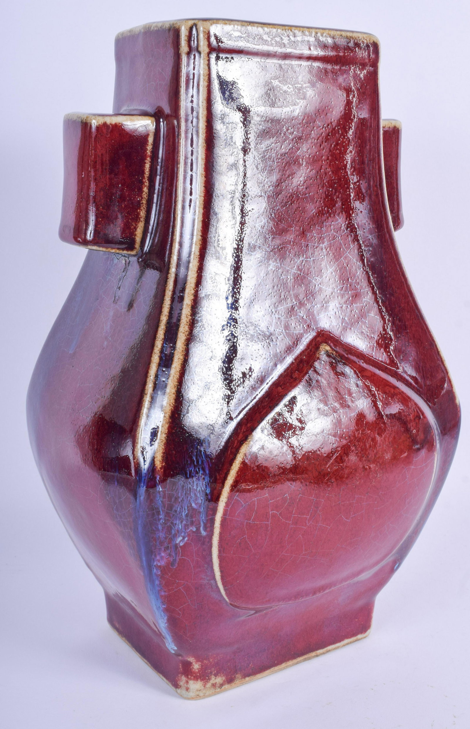 A LARGE CHINESE TWIN HANDLED FLAMBE POTTERY HU VASE: A LARGE CHINESE TWIN HANDLED FLAMBE POTTERY HU VASE 20th Century. 32 cm x 15 cm.