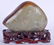 AN EARLY 20TH CENTURY CHINESE CARVED RUSSET JADE