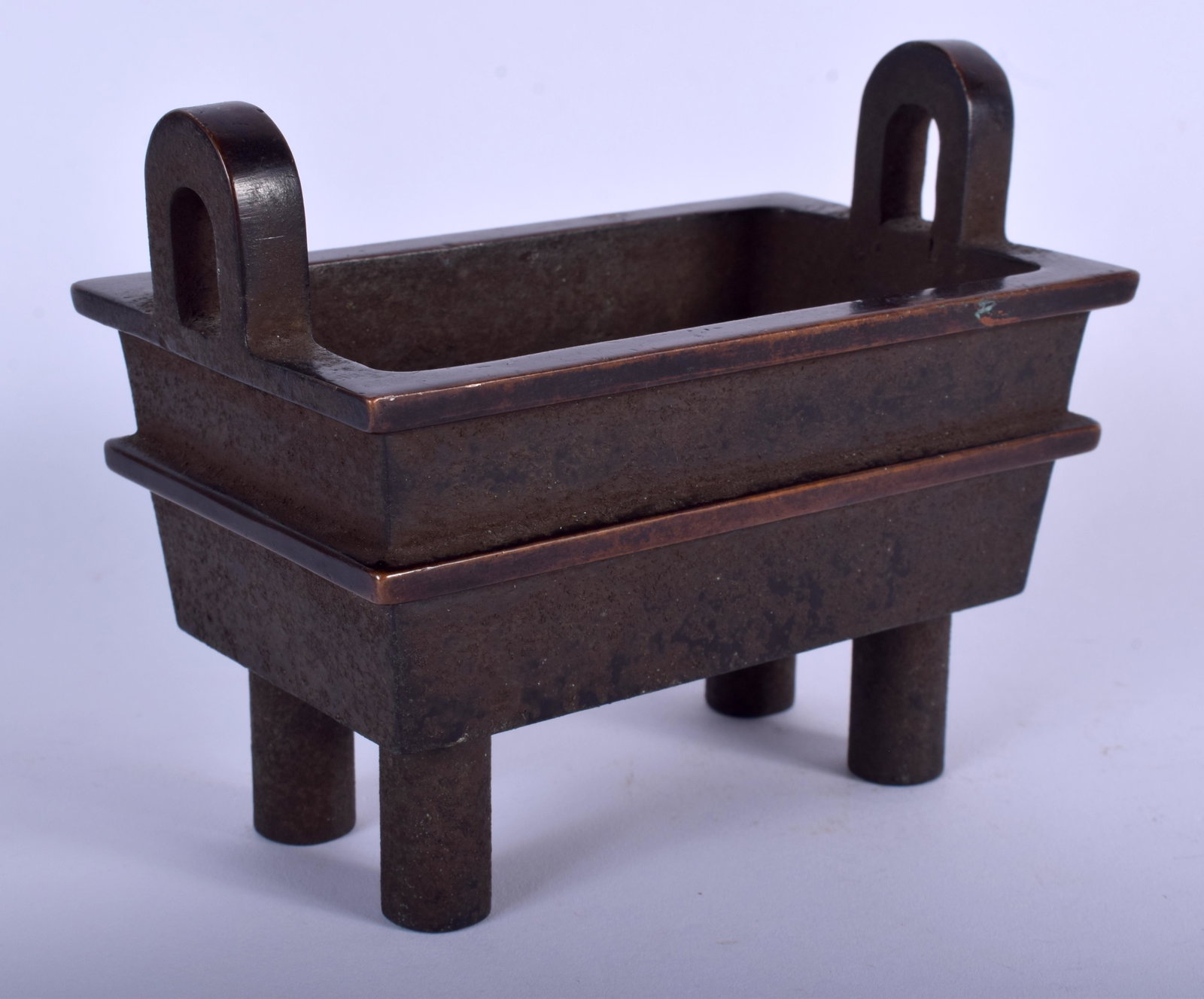 A CHINESE TWIN HANDLED BRONZE CENSER. 13 cm x 11 cm.: A CHINESE TWIN HANDLED BRONZE CENSER. 13 cm x 11 cm.