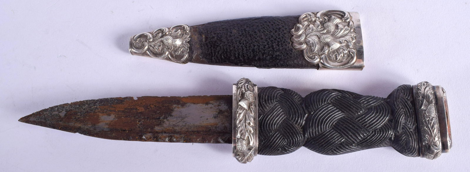 A VINTAGE SCOTTISH WHITE METAL CITRINE MOUNTED DIRK (1 of 2)