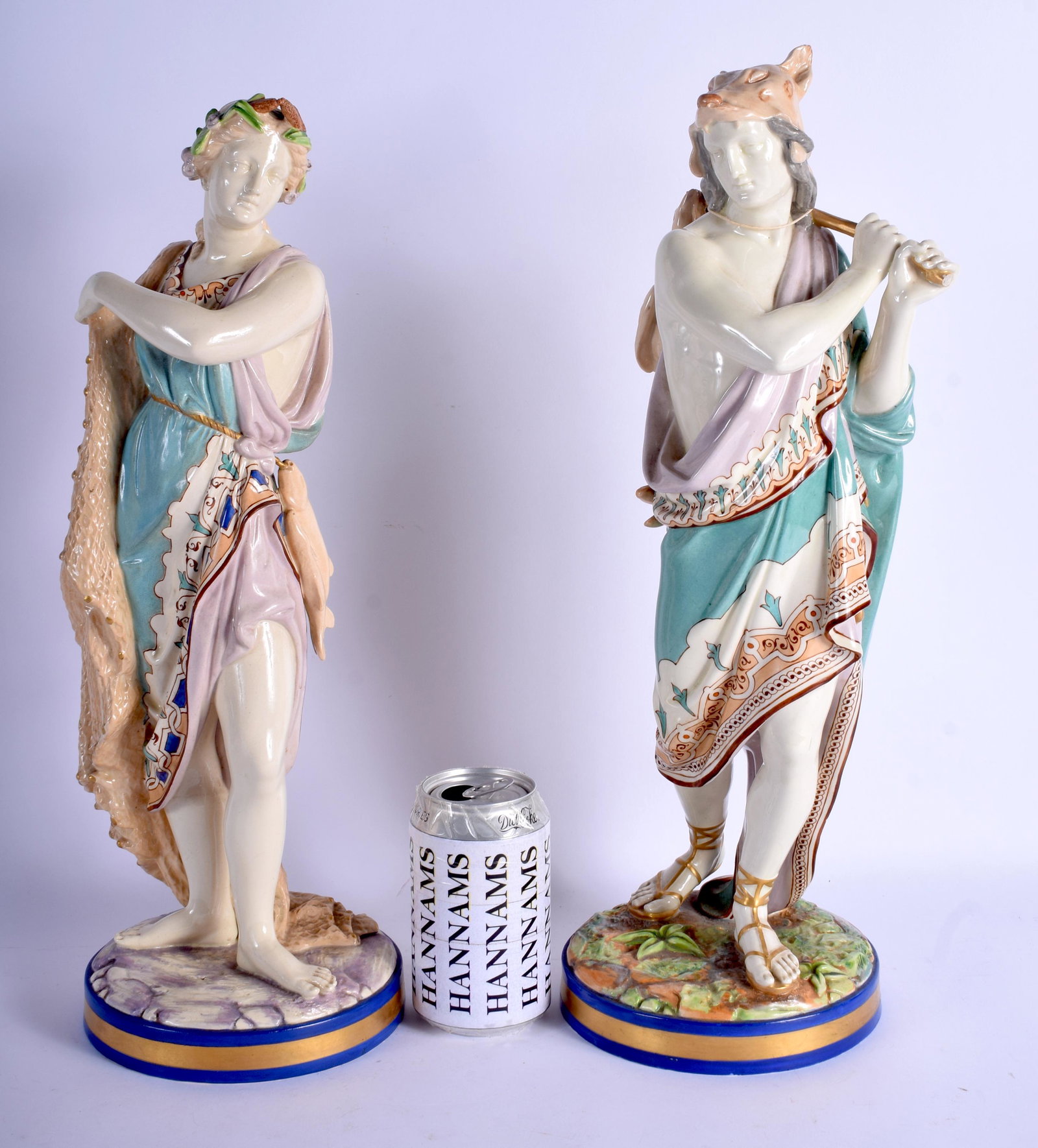 A RARE LARGE PAIR OF 19TH CENTURY ROYAL WORCESTER: A RARE LARGE PAIR OF 19TH CENTURY ROYAL WORCESTER PORCELAIN FIGURES with unusual enamelled colourway. 45 cm high.
