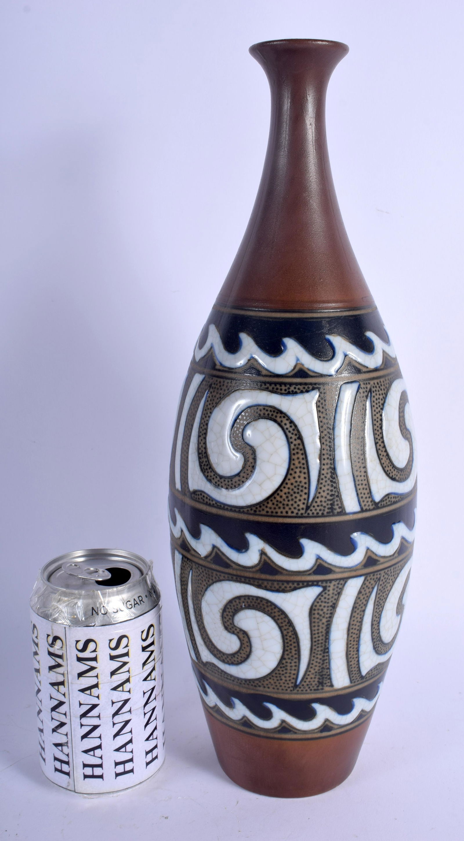 A LARGE CONTEMPOARY STUDIO POTTERY SLIP DECORATED VASE: A LARGE CONTEMPOARY STUDIO POTTERY SLIP DECORATED VASE in the manner of Boch Freres. 37 cm high.