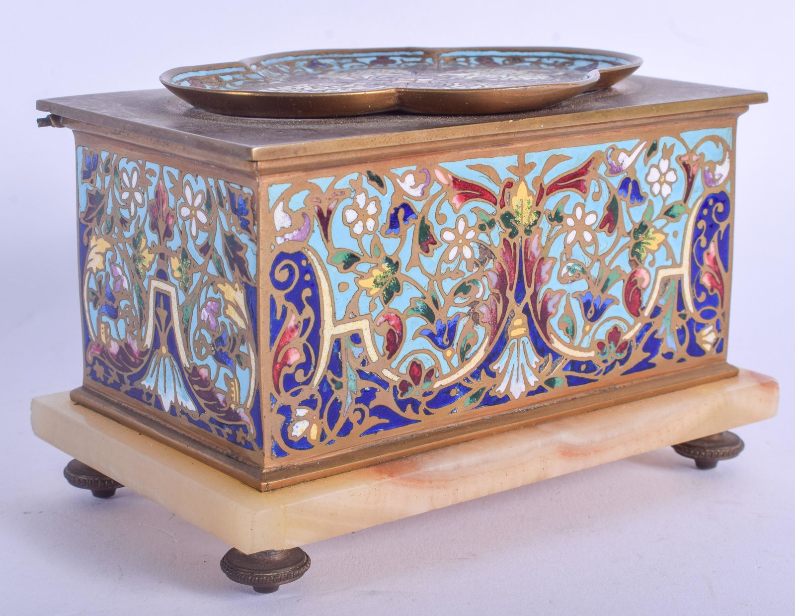 A 19TH CENTURY FRENCH CHAMPLEVE ENAMEL AND BRONZE: A 19TH CENTURY FRENCH CHAMPLEVE ENAMEL AND BRONZE CASKET decorated with foliage. 13 cm x 10 cm.