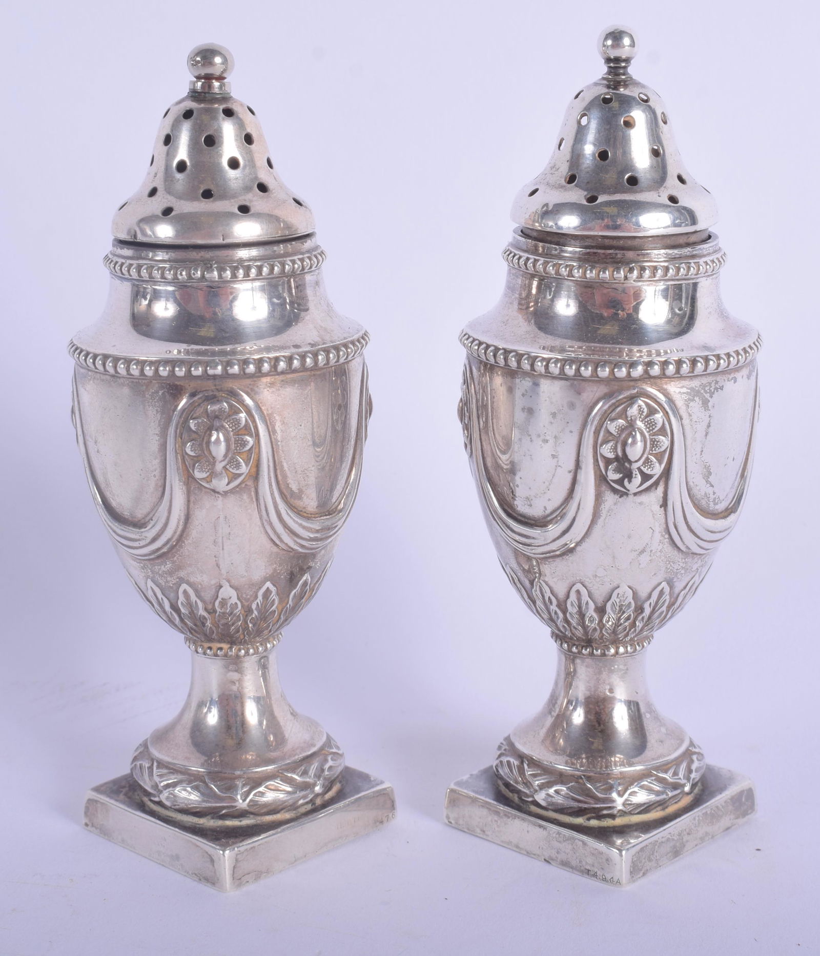 A PAIR OF VICTORIAN SILVER CONDIMENTS. Sheffield 1886. (1 of 3)