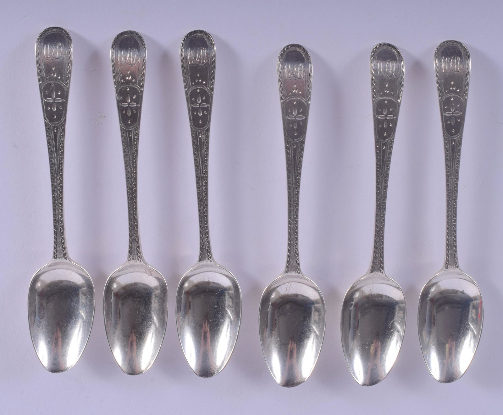 A SET OF SIX GEORGE III SILVER TEASPOONS by George: A SET OF SIX GEORGE III SILVER TEASPOONS by George Gray. London 1788. 3.5 oz. 10 cm long. (6)