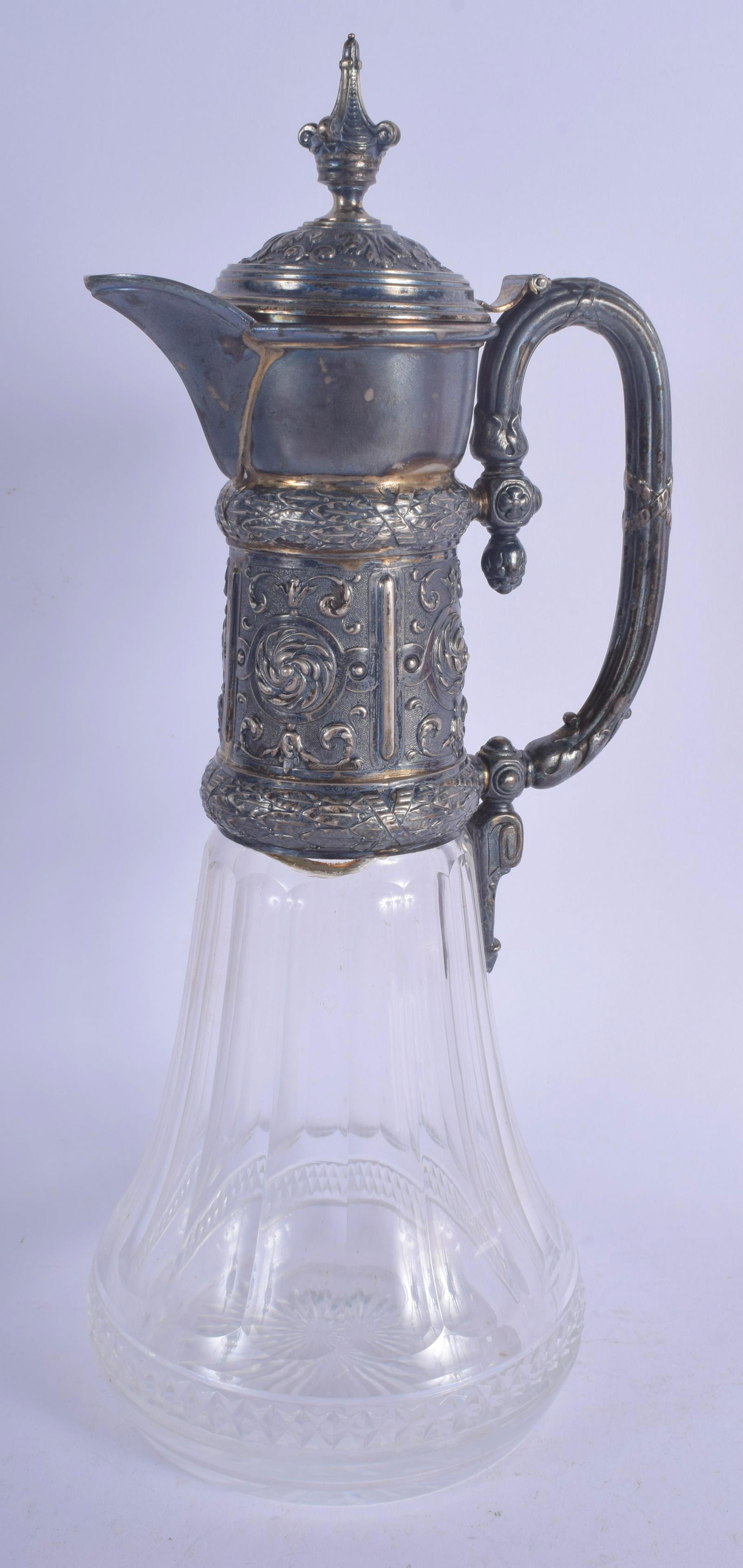 AN ANTIQUE CONTINENTAL SILVER MOUNTED GLASS CLARET JUG. (1 of 3)