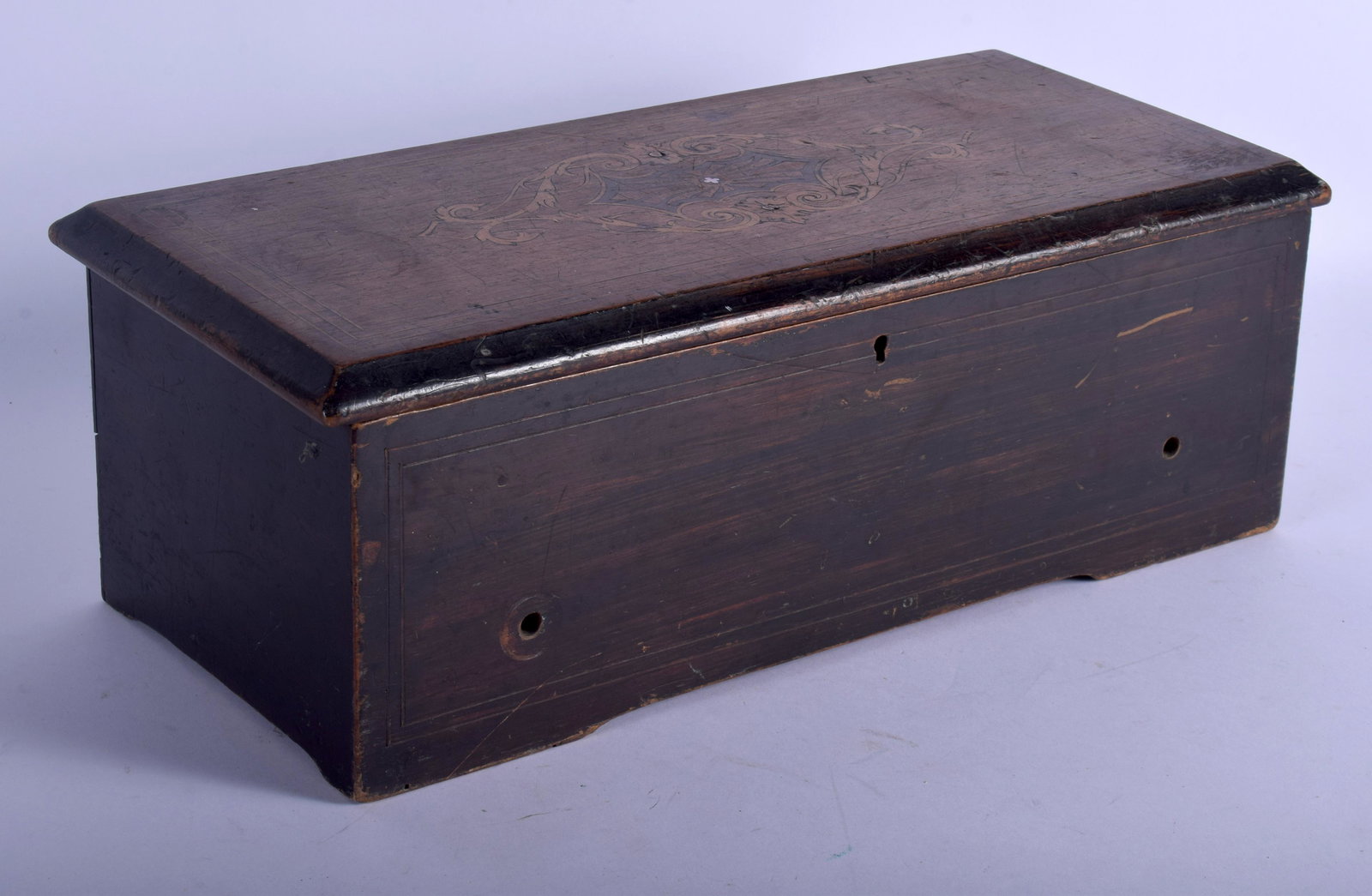 AN ANTIQUE SWISS MUSICIAL BOX. 37 cm wide.: AN ANTIQUE SWISS MUSICIAL BOX. 37 cm wide.