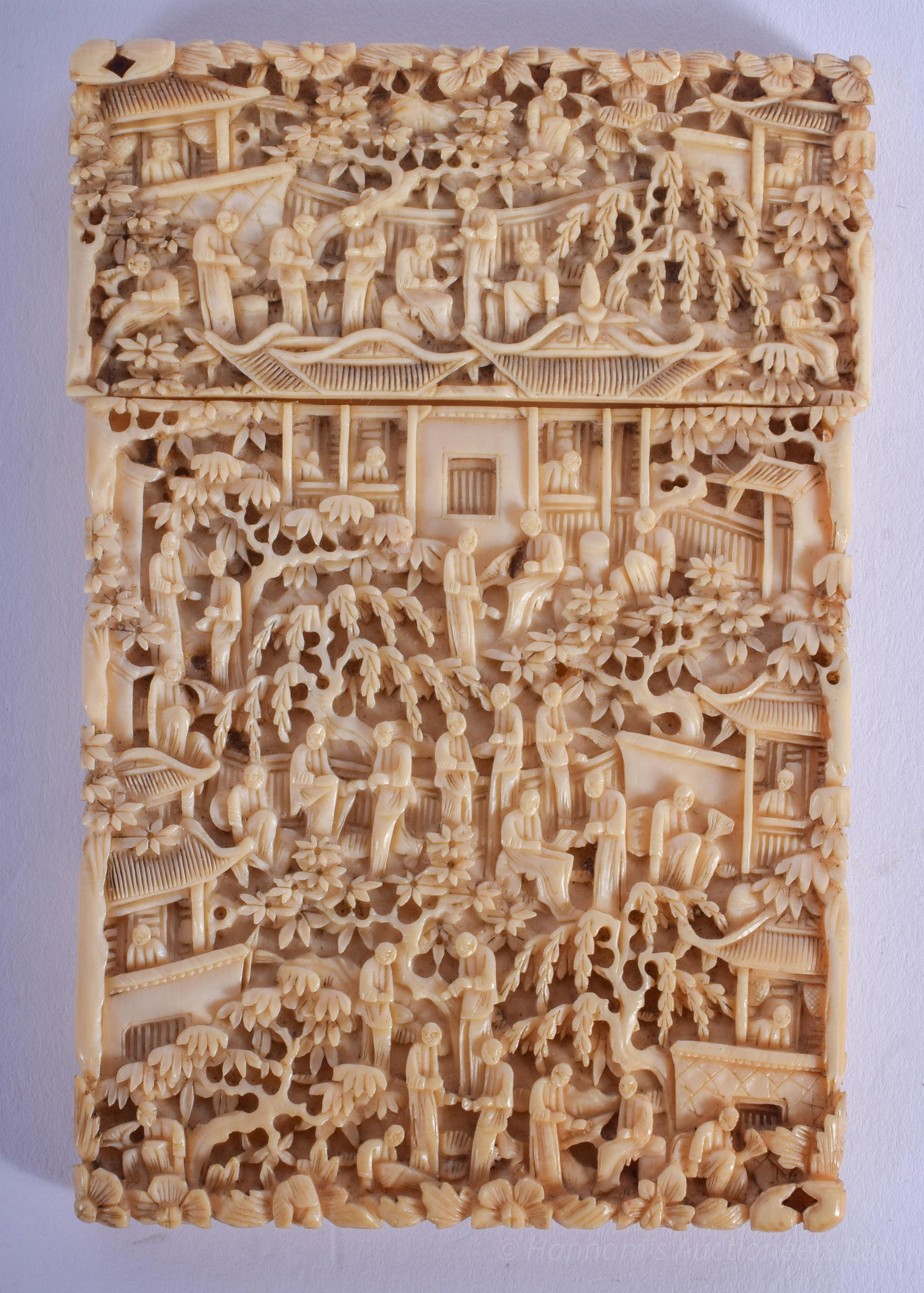 A 19TH CENTURY CHINESE CANTON BONE CARD CASE AND COVER: A 19TH CENTURY CHINESE CANTON BONE CARD CASE AND COVER Qing, decorated with figures within landscapes. 7.5 cm x 11 cm.