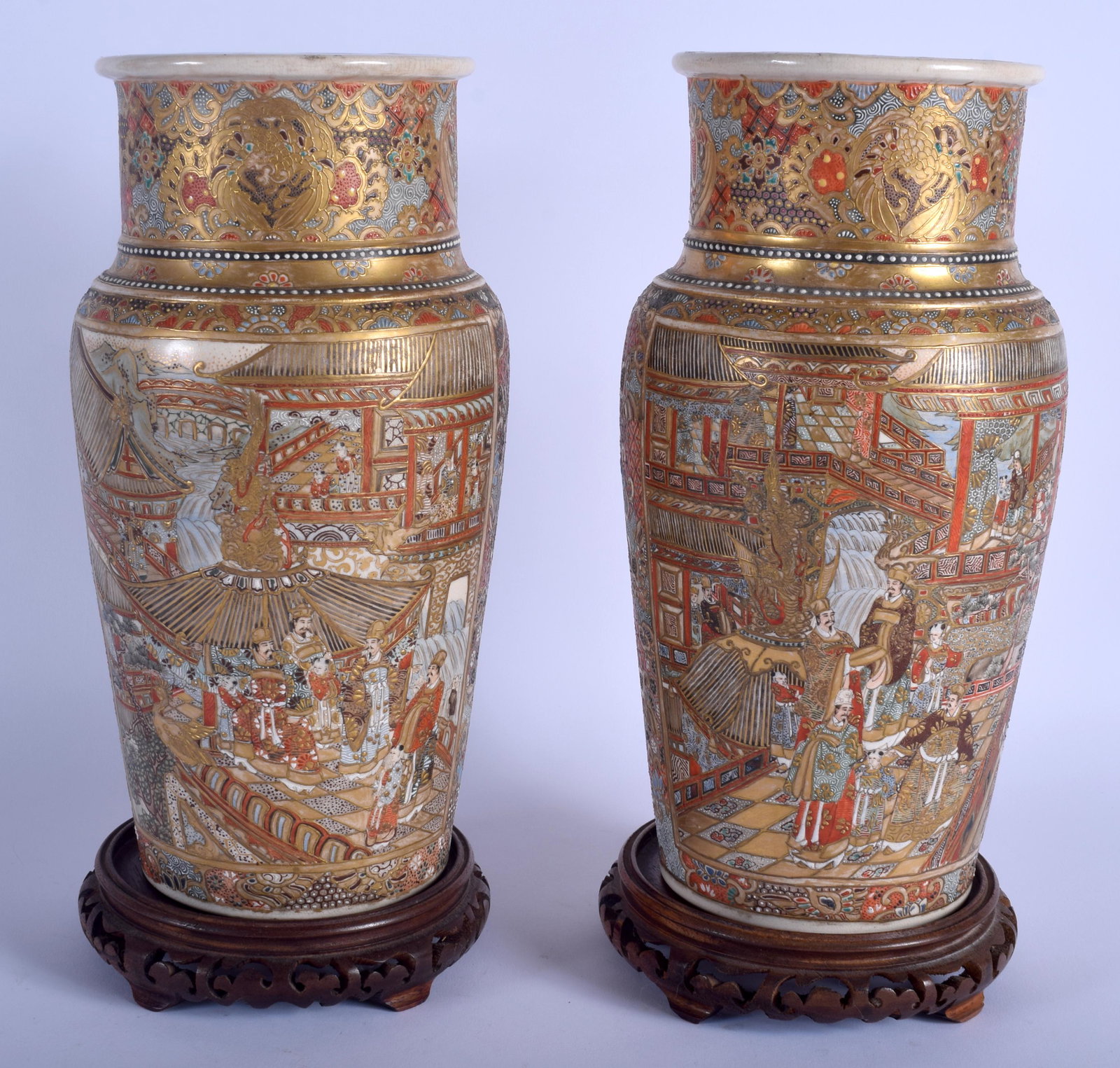 A PAIR OF 19TH CENTURY JAPANESE MEIJI PERIOD SATSUMA: A PAIR OF 19TH CENTURY JAPANESE MEIJI PERIOD SATSUMA VASES painted with figures and landscapes. 30 cm high.