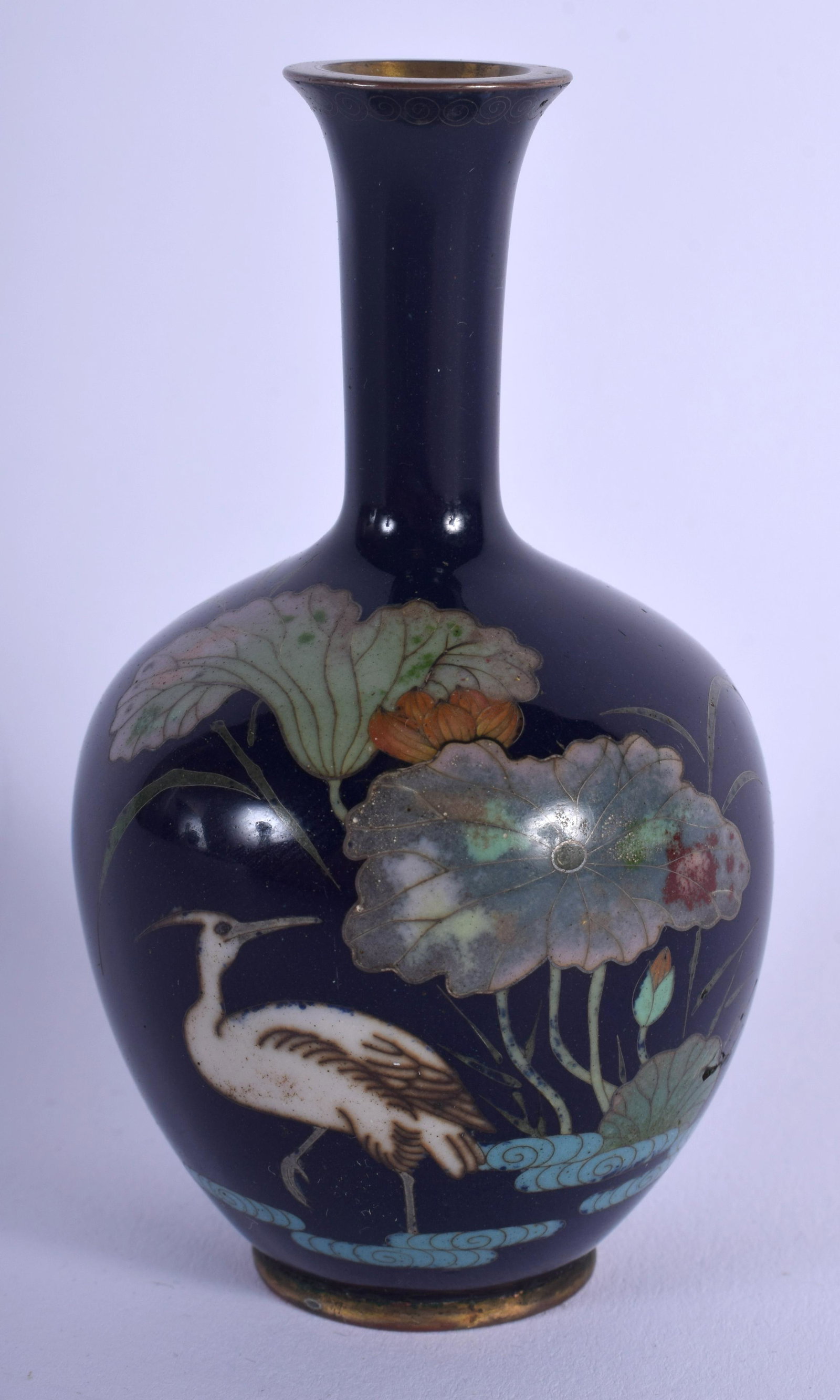 A MINIATURE 19TH CENTURY JAPANESE MEIJI PERIOD: A MINIATURE 19TH CENTURY JAPANESE MEIJI PERIOD CLOISONNÉ ENAMEL VASE decorated with a bird amongst foliage. 9 cm high.