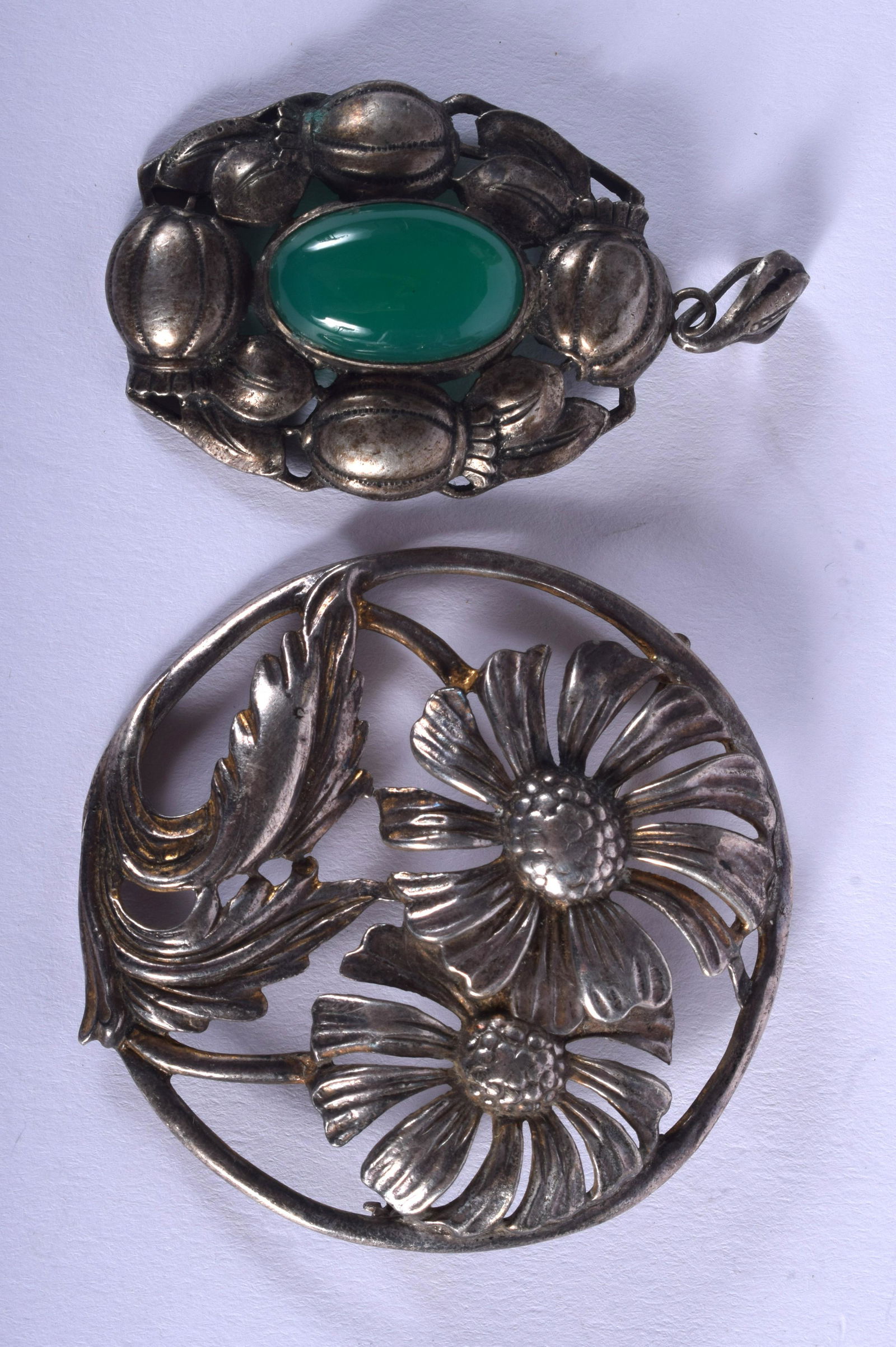 A VINTAGE STERLING SILVER SUNFLOWER BROOCH and another. (1 of 2)