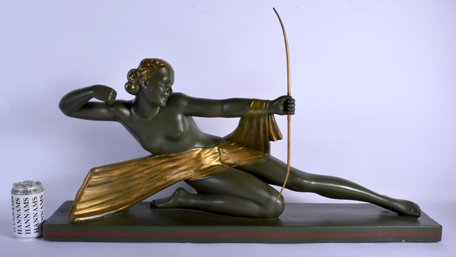 A VERY LARGE FRENCH ART DECO COLD PAINTED PLASTER: A VERY LARGE FRENCH ART DECO COLD PAINTED PLASTER FIGURE OF DIANA modelled in gilt embellished robes. 85 cm x 47 cm.