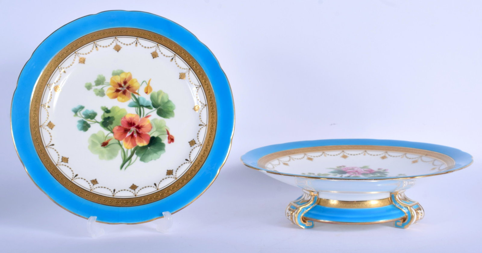 AN ANTIQUE MINTON PLATE together with a similar tazza.: AN ANTIQUE MINTON PLATE together with a similar tazza. 23 cm wide. (2)