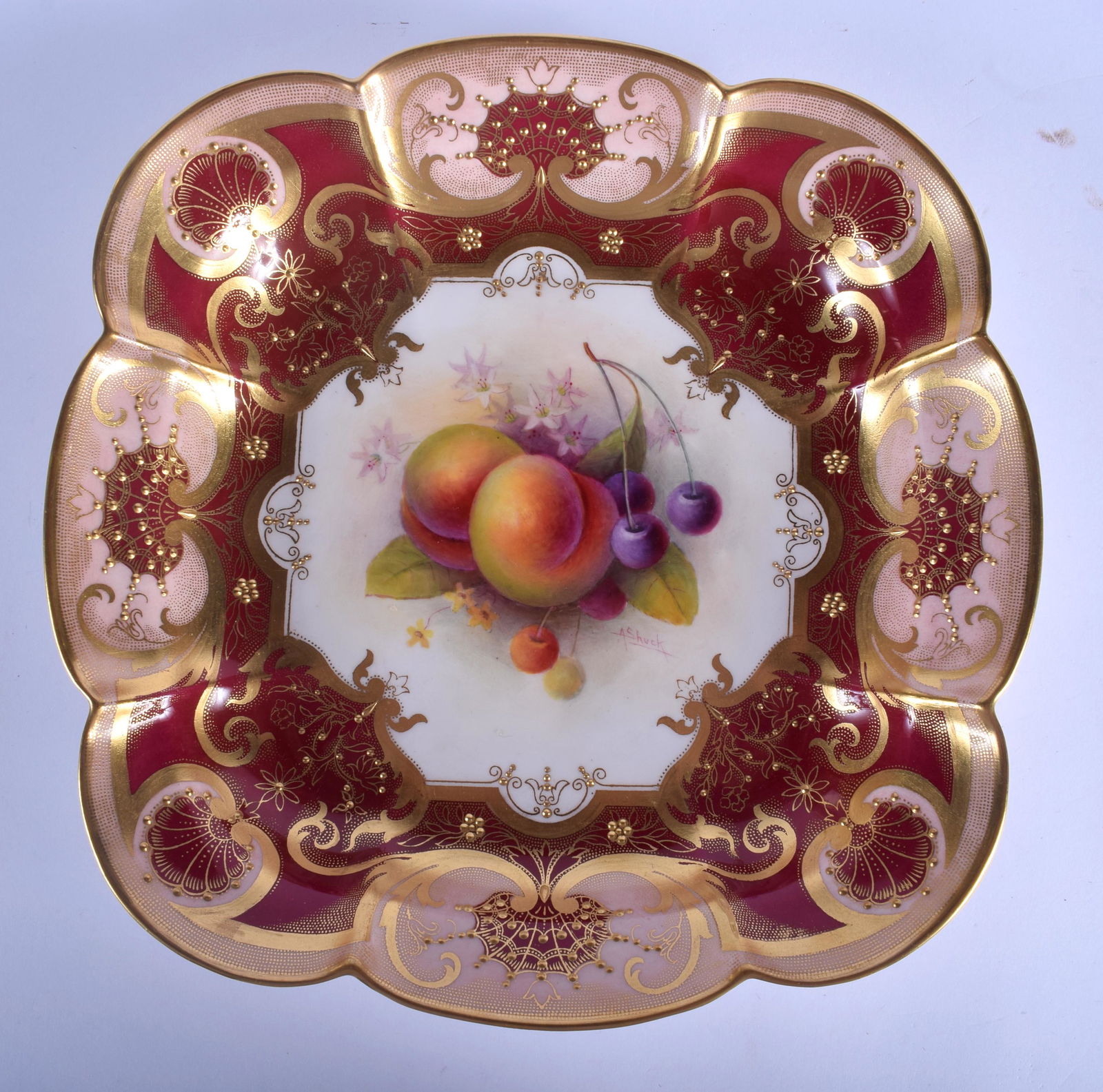 Royal Worcester square dish painted with fruit under a: Royal Worcester square dish painted with fruit under a crimson and gilt border date code 1929. 24cm wide